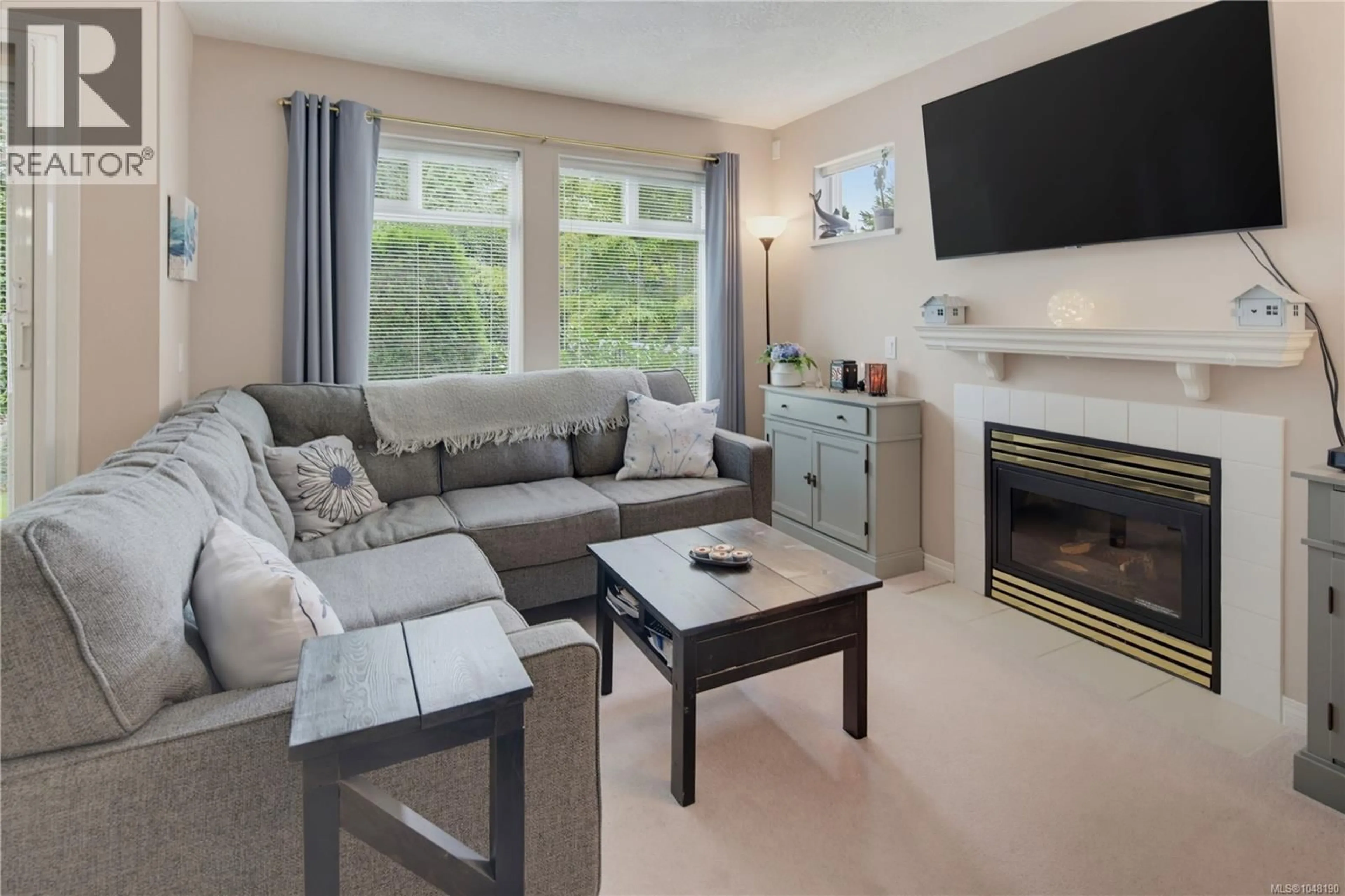 Living room with furniture, unknown for 102 - 1196 SLUGGETT ROAD, Central Saanich British Columbia V8M2J3
