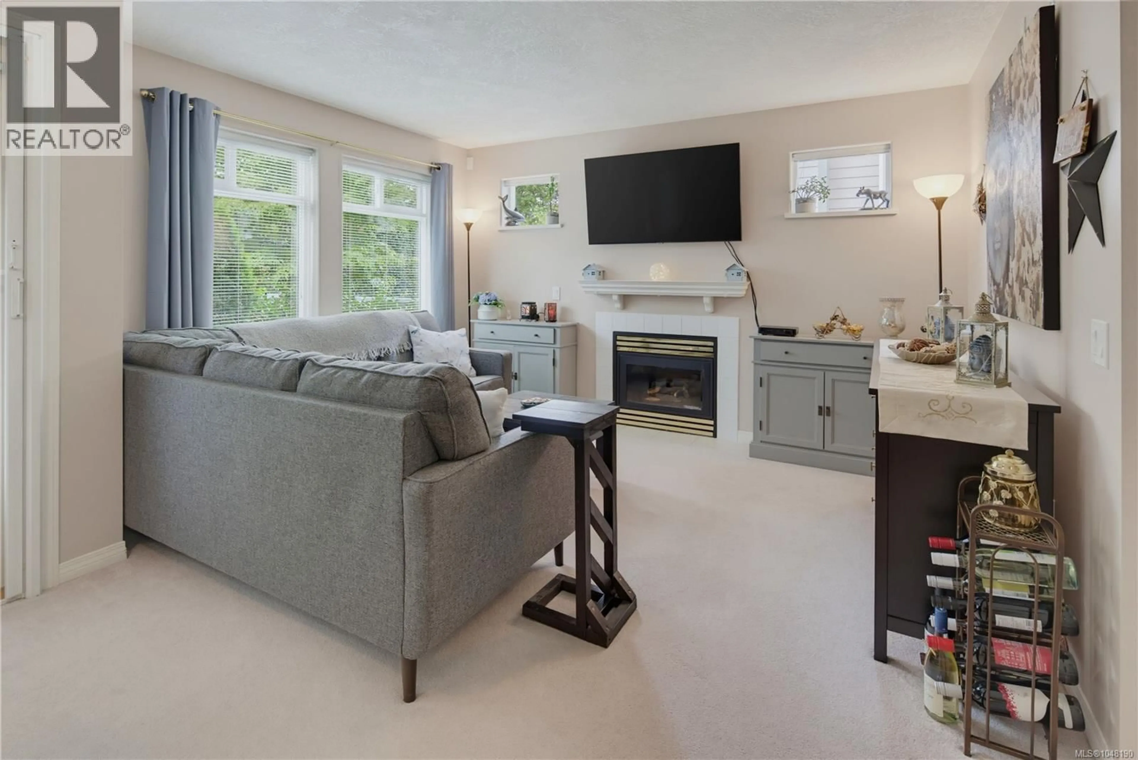 Living room with furniture, unknown for 102 - 1196 SLUGGETT ROAD, Central Saanich British Columbia V8M2J3
