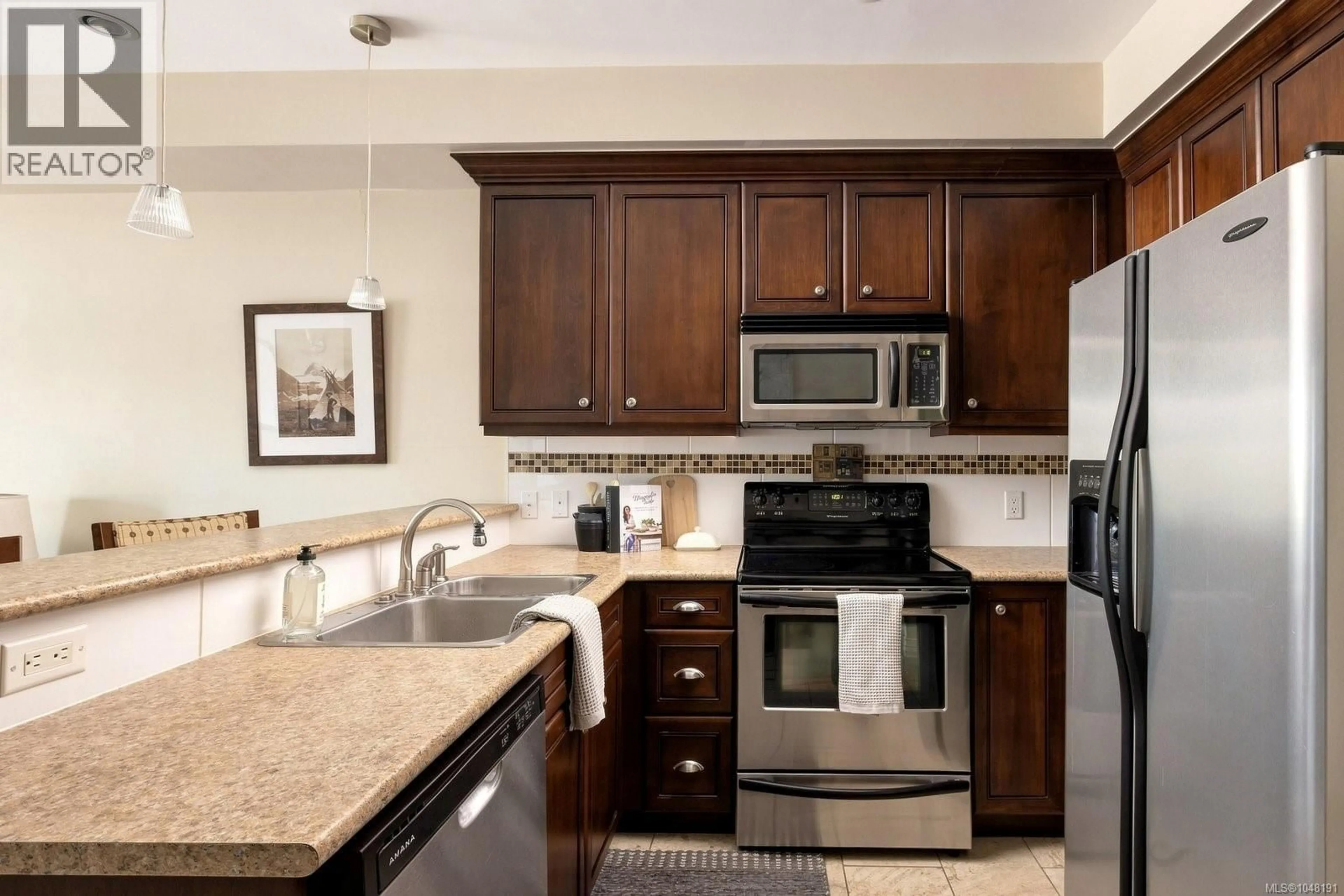 Standard kitchen, ceramic/tile floor for 207 - 1335 BEAR MOUNTAIN PARKWAY, Langford British Columbia V9B6T9