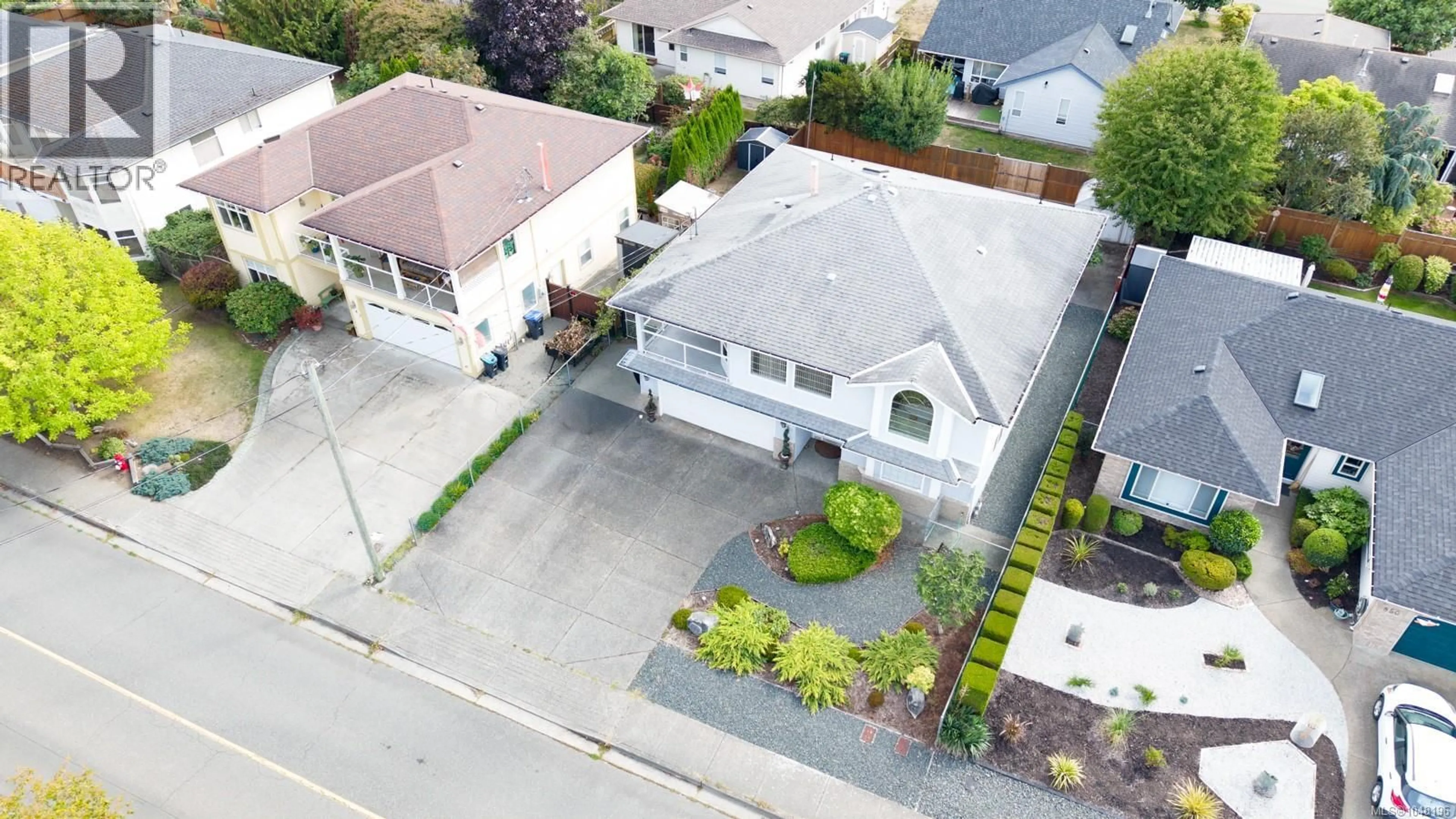 A pic from outside/outdoor area/front of a property/back of a property/a pic from drone, street for 846 WRIGHT ROAD, Parksville British Columbia V9P1Z9