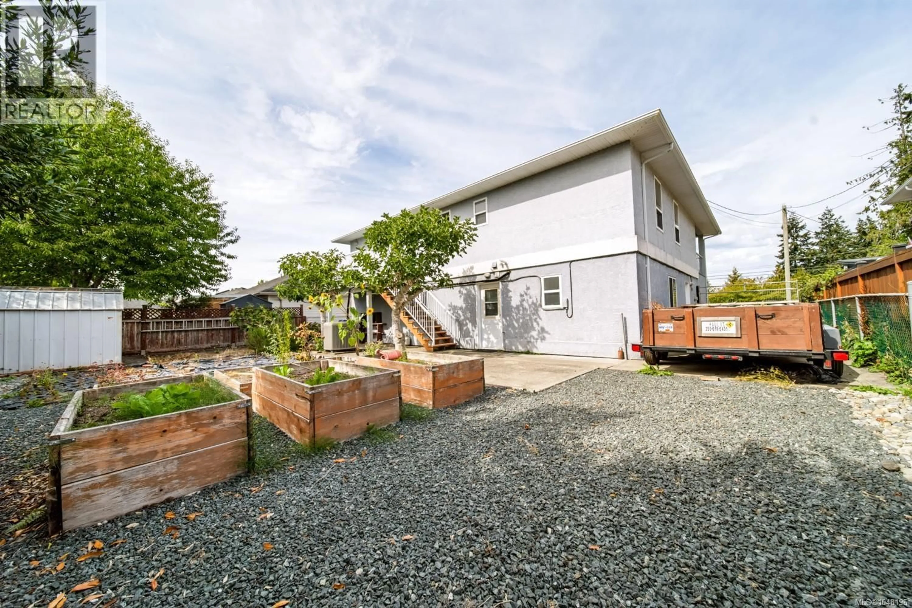 A pic from outside/outdoor area/front of a property/back of a property/a pic from drone, street for 846 WRIGHT ROAD, Parksville British Columbia V9P1Z9