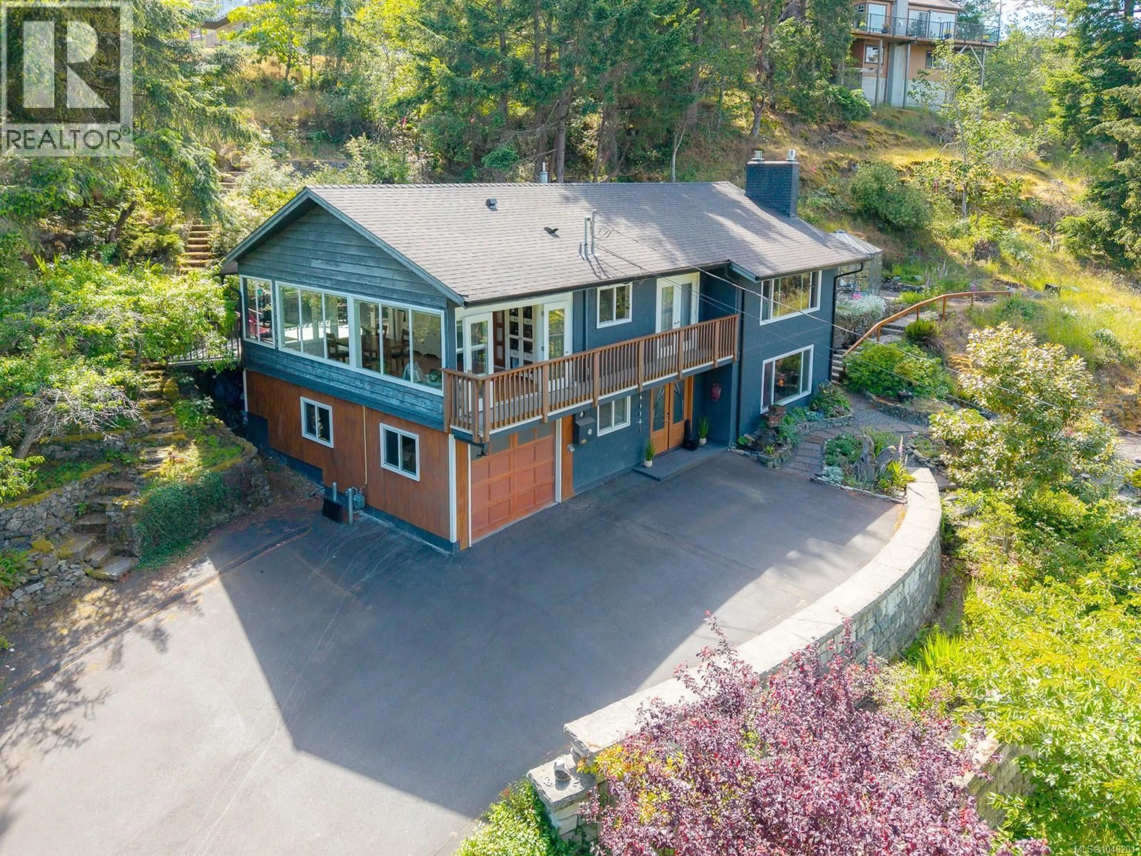 A pic from outside/outdoor area/front of a property/back of a property/a pic from drone, unknown for 3583 HAMMOND BAY ROAD, Nanaimo British Columbia V9T1E8