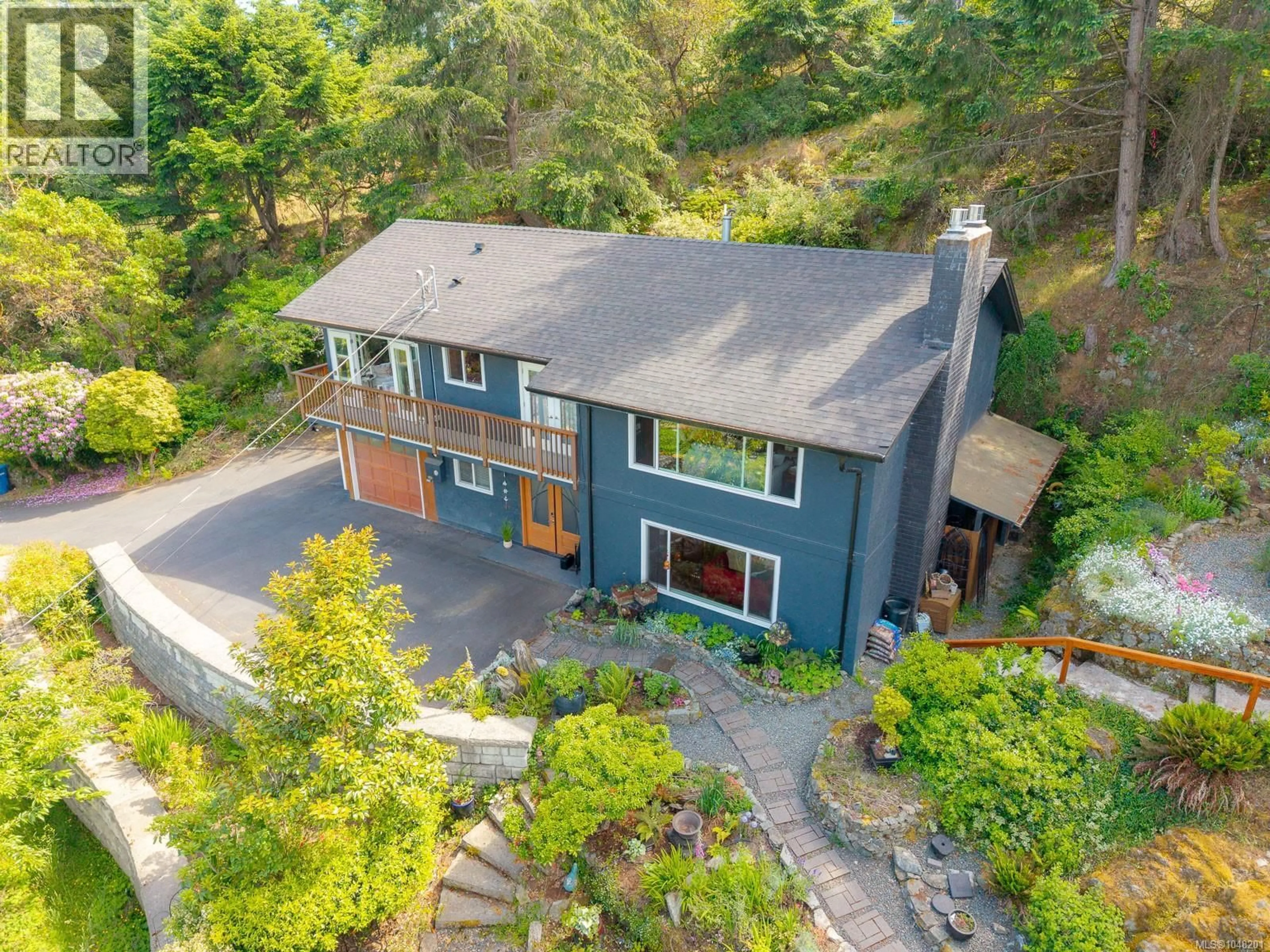 A pic from outside/outdoor area/front of a property/back of a property/a pic from drone, street for 3583 HAMMOND BAY ROAD, Nanaimo British Columbia V9T1E8
