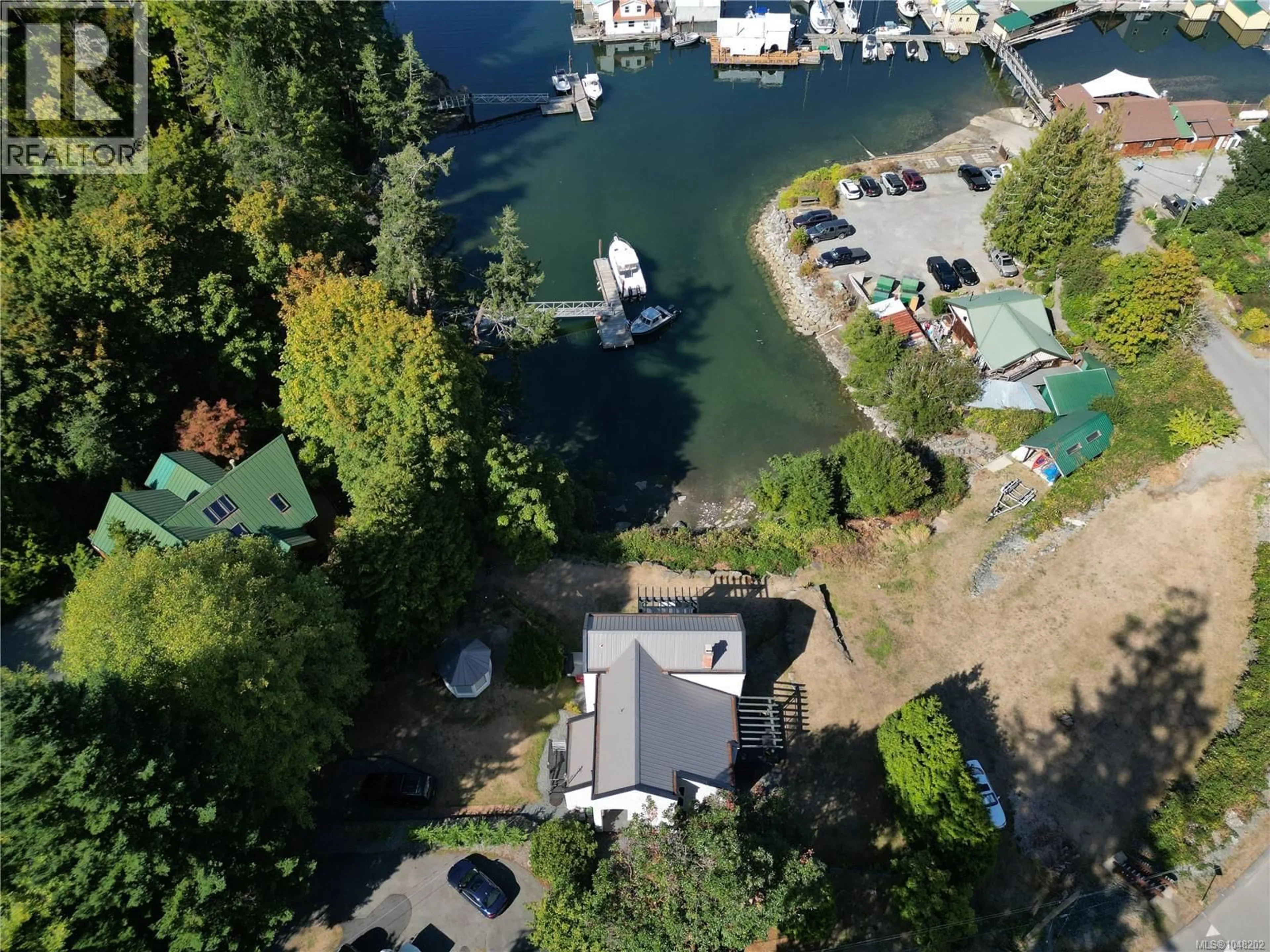 A pic from outside/outdoor area/front of a property/back of a property/a pic from drone, water/lake/river/ocean view for 5025 GENOA BAY ROAD, Duncan British Columbia V9L5Y6