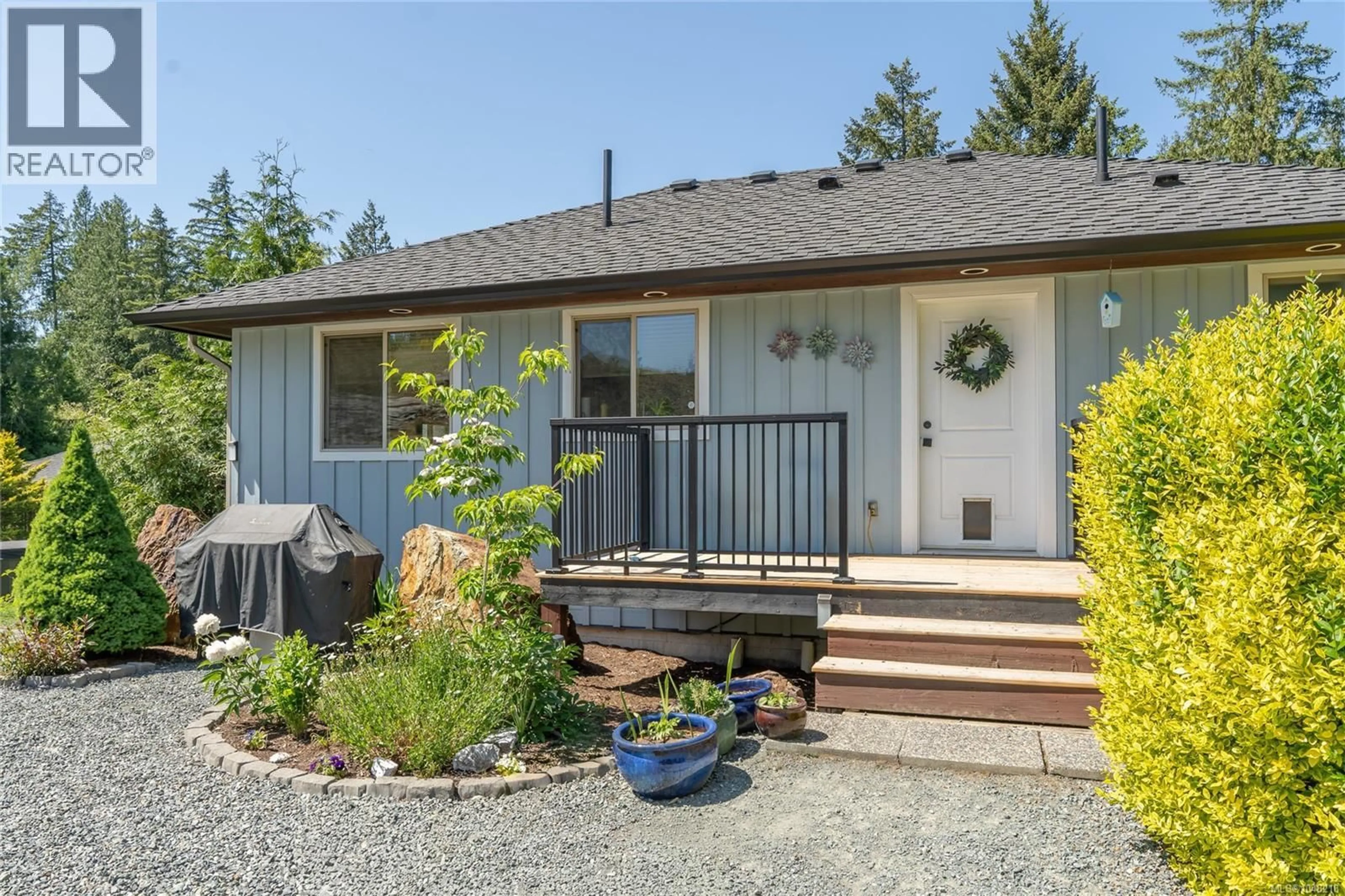 Home with vinyl exterior material, street for 7487 RELKE ROAD, Duncan British Columbia V9L6A7