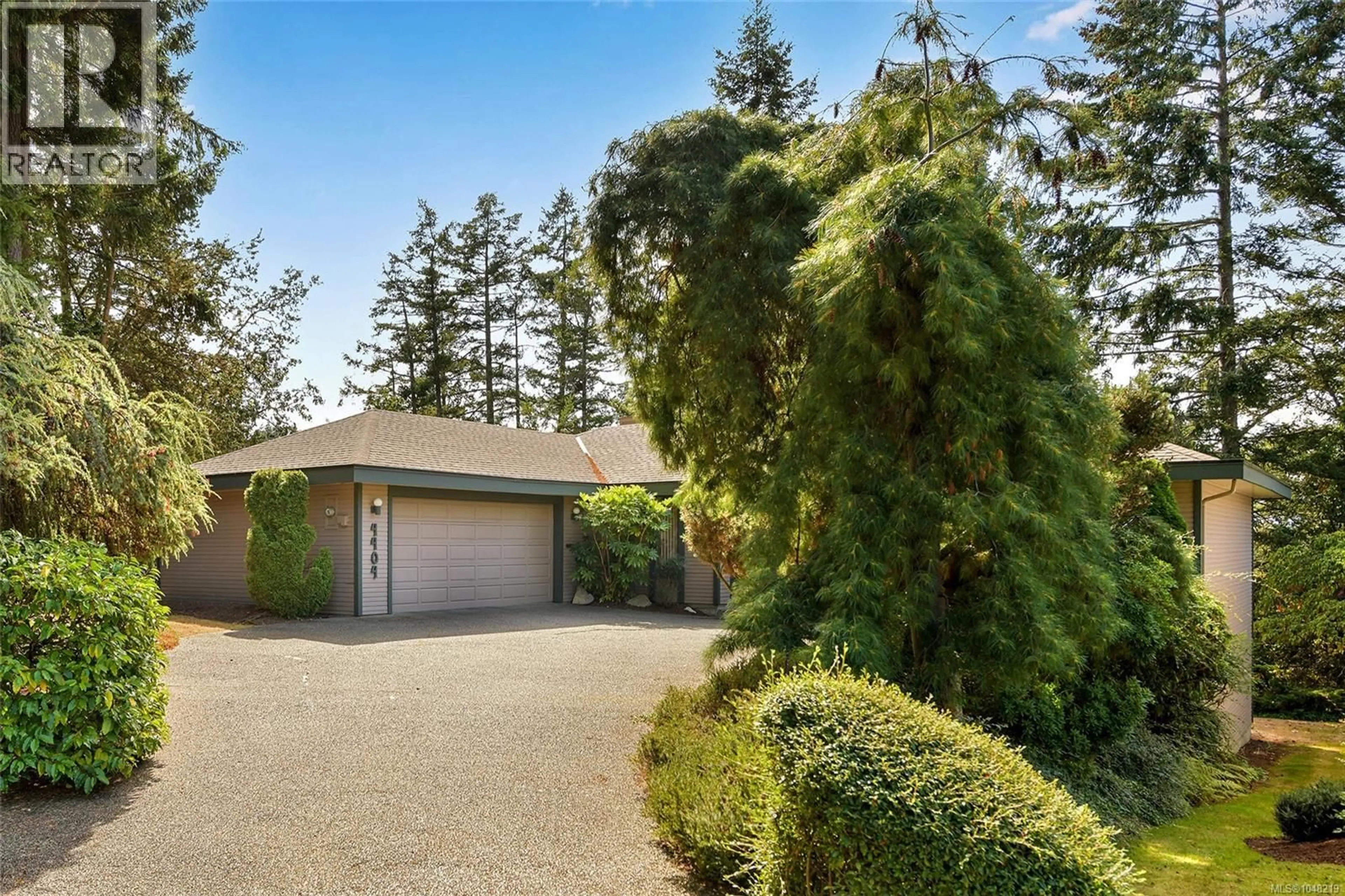 A pic from outside/outdoor area/front of a property/back of a property/a pic from drone, street for 4404 MEADOWOOD PLACE, Saanich British Columbia V8X4V7