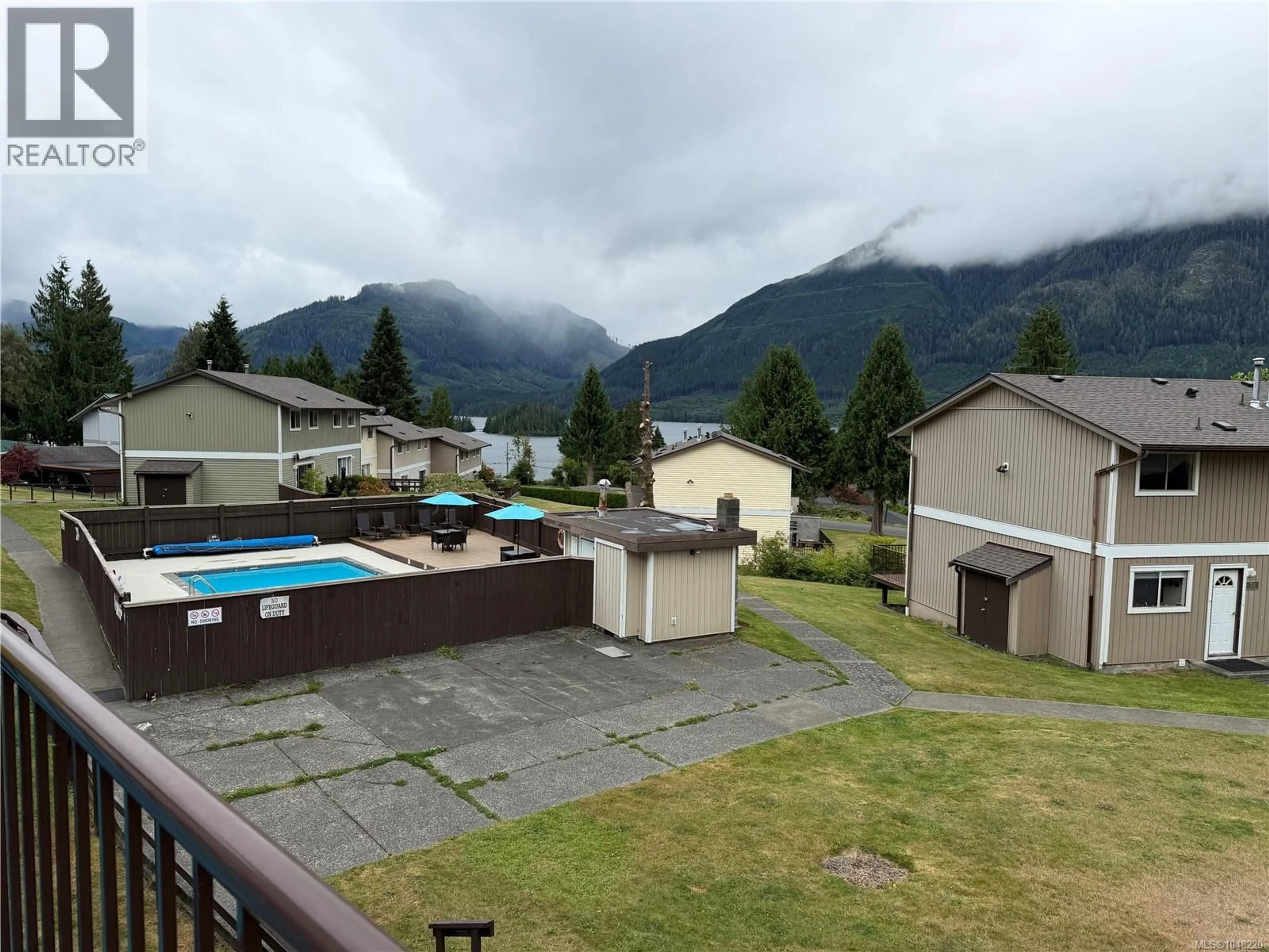 A pic from outside/outdoor area/front of a property/back of a property/a pic from drone, mountain view for 404 HAIDA AVENUE, Port Alice British Columbia V0N2N0