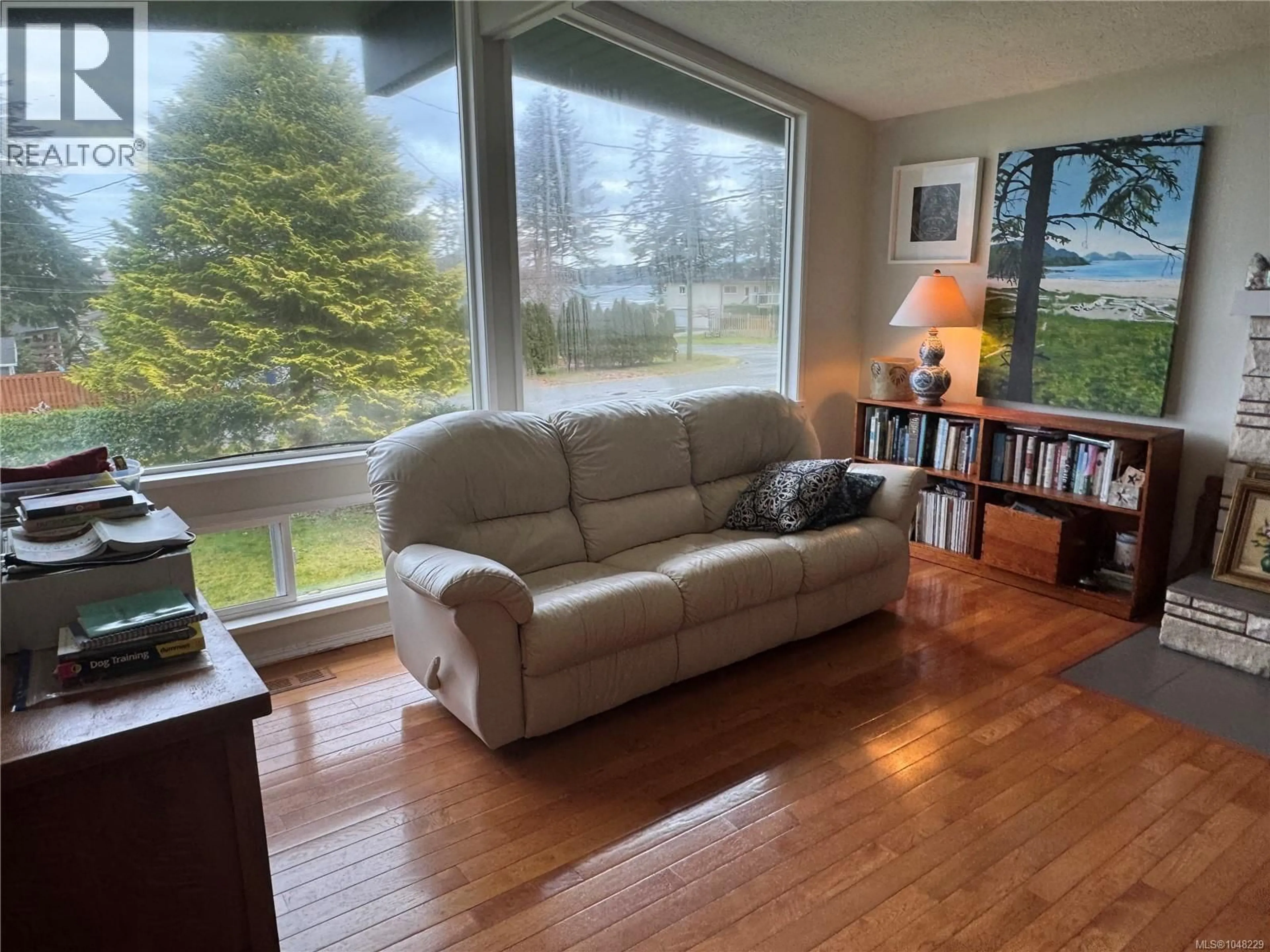 Living room with furniture, wood/laminate floor for 6420 CHATHAM AVENUE, Port Hardy British Columbia V0N2P0