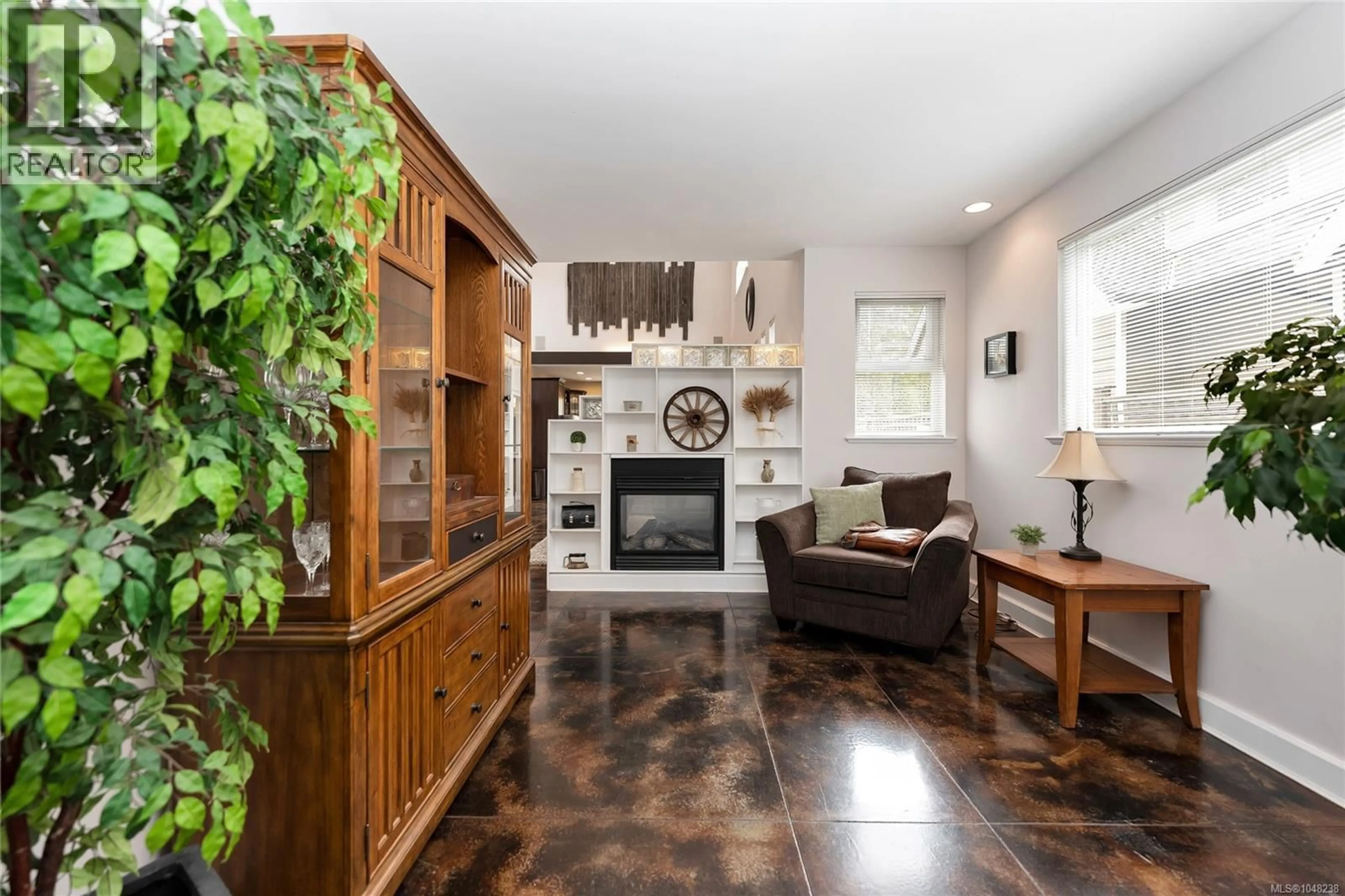 Living room with furniture, ceramic/tile floor for 4151 QUADRA STREET, Saanich British Columbia V8X1L1