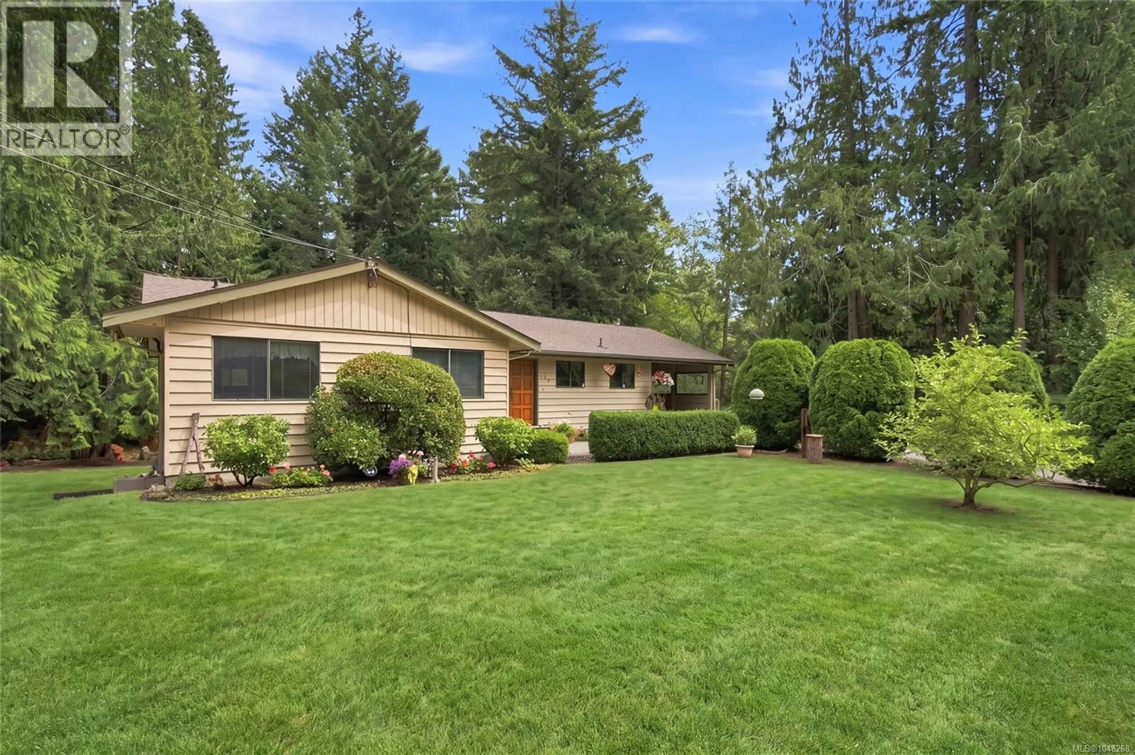 Home with vinyl exterior material, unknown for 103 GREEN LAKE CRESCENT, Lantzville British Columbia V0R2H0