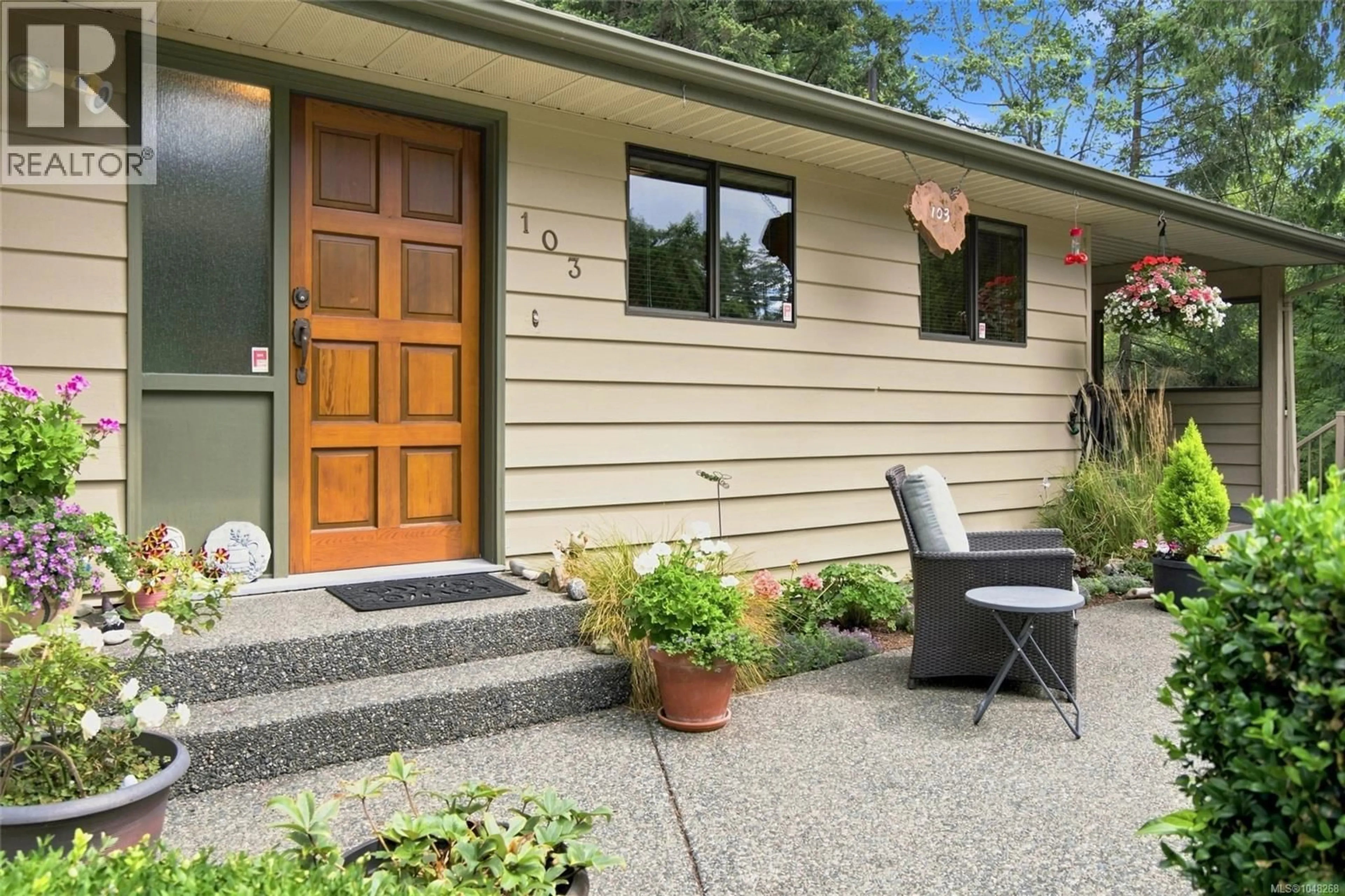 Home with vinyl exterior material, street for 103 GREEN LAKE CRESCENT, Lantzville British Columbia V0R2H0