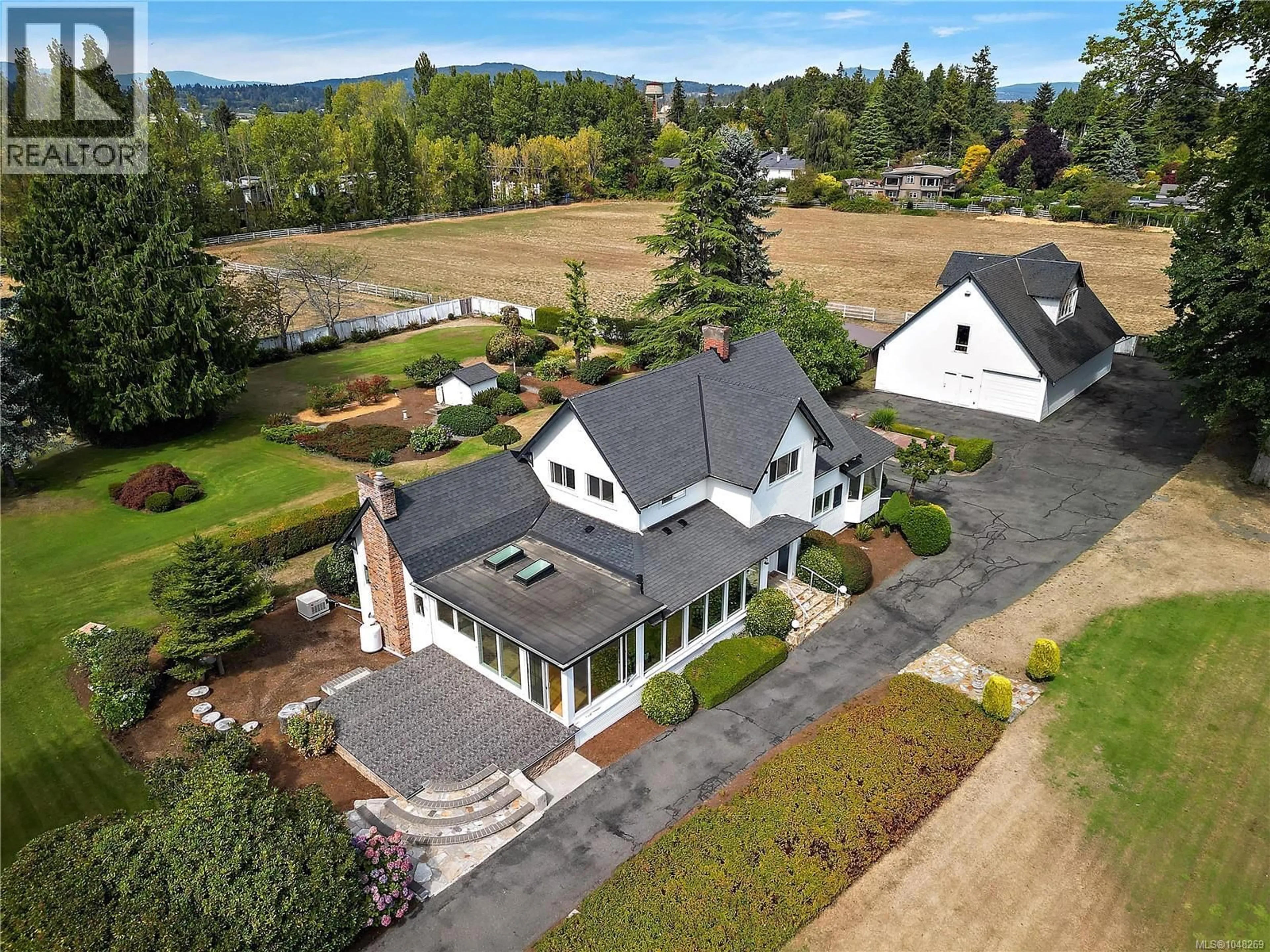 A pic from outside/outdoor area/front of a property/back of a property/a pic from drone, unknown for 3190 MARTINDALE ROAD, Central Saanich British Columbia V8M1W6