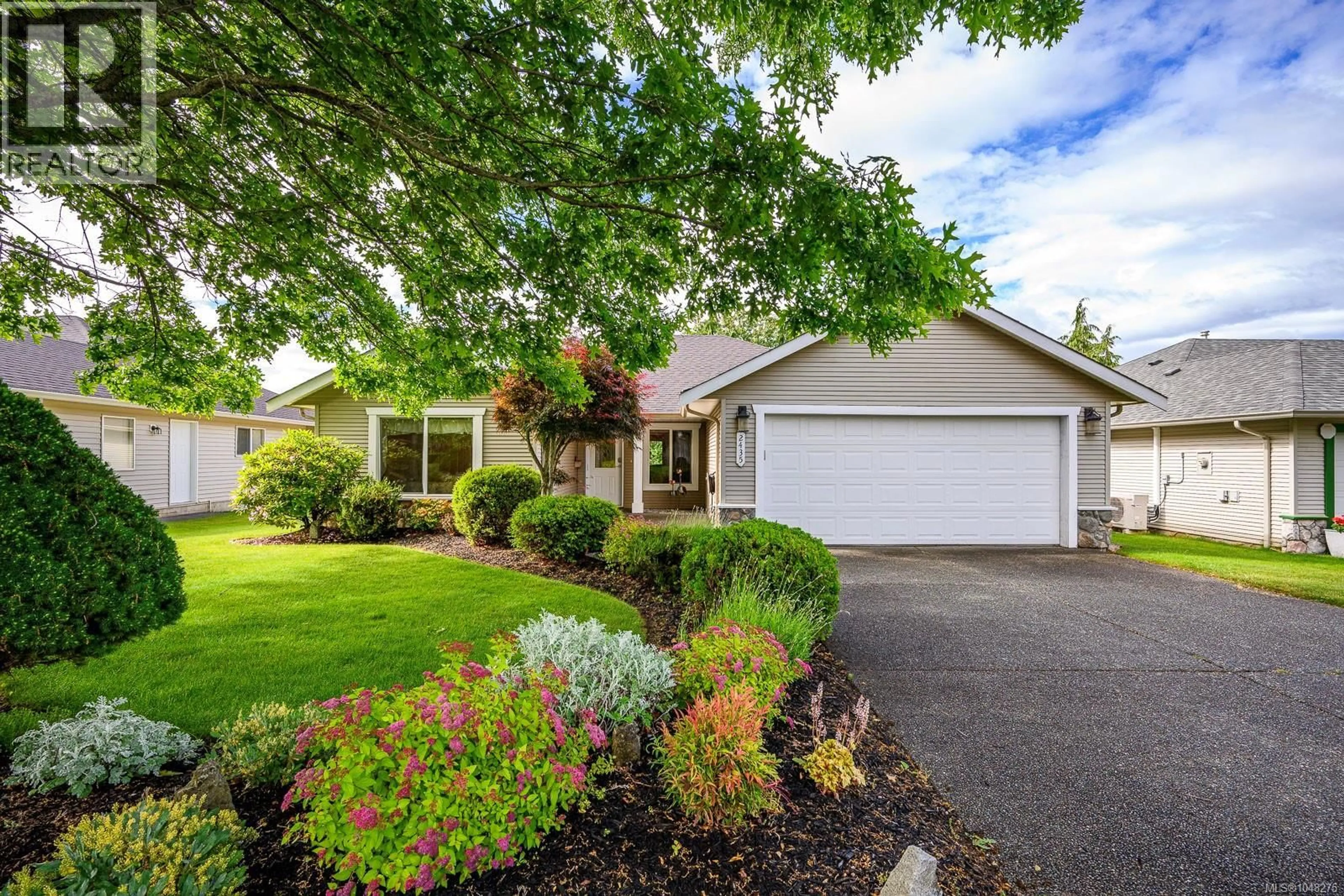 Home with vinyl exterior material, street for 2435 IDIENS WAY, Courtenay British Columbia V9N9J3