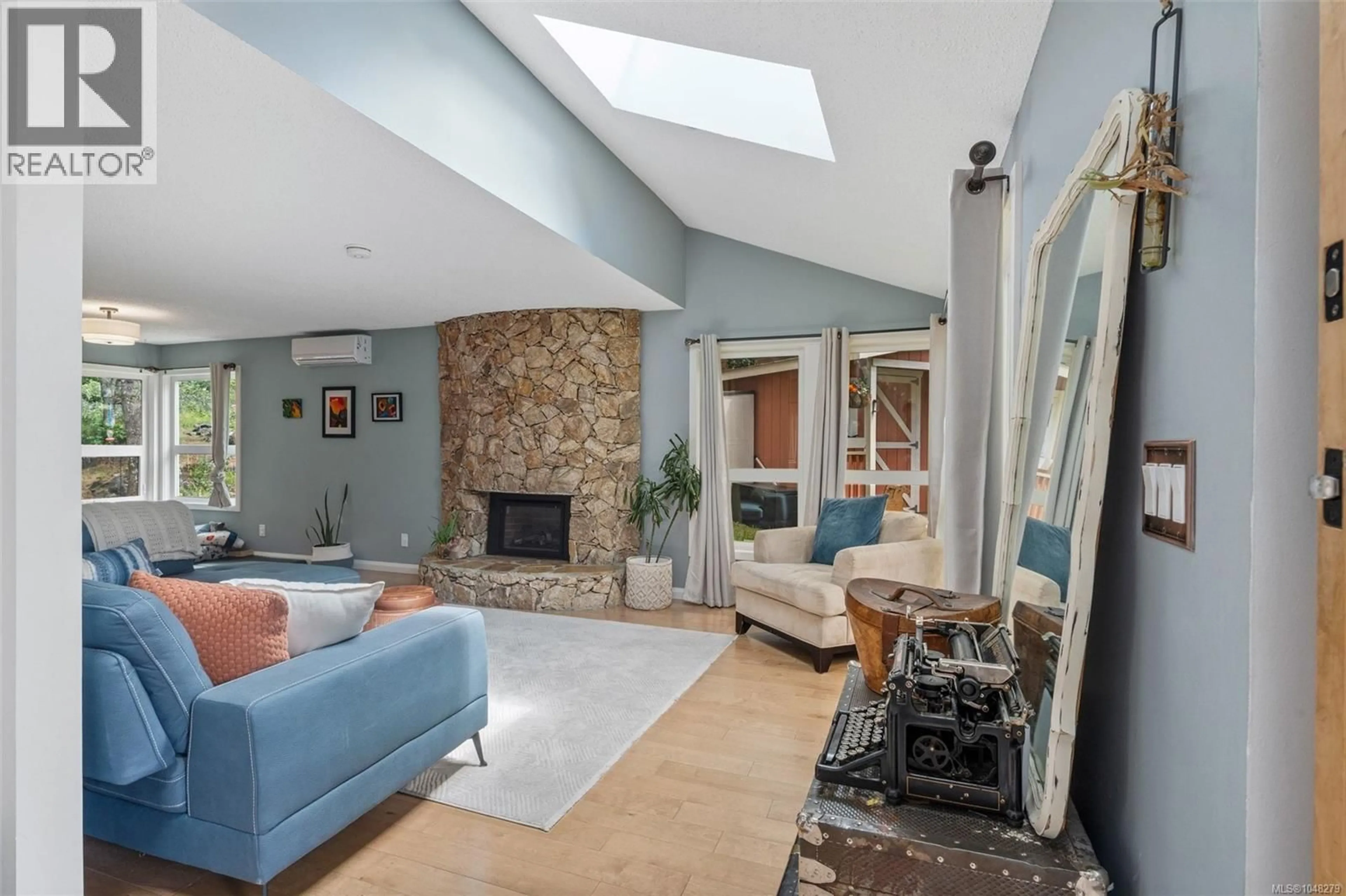 Living room with furniture, ceramic/tile floor for 335 DAMON DRIVE, View Royal British Columbia V9B5G5