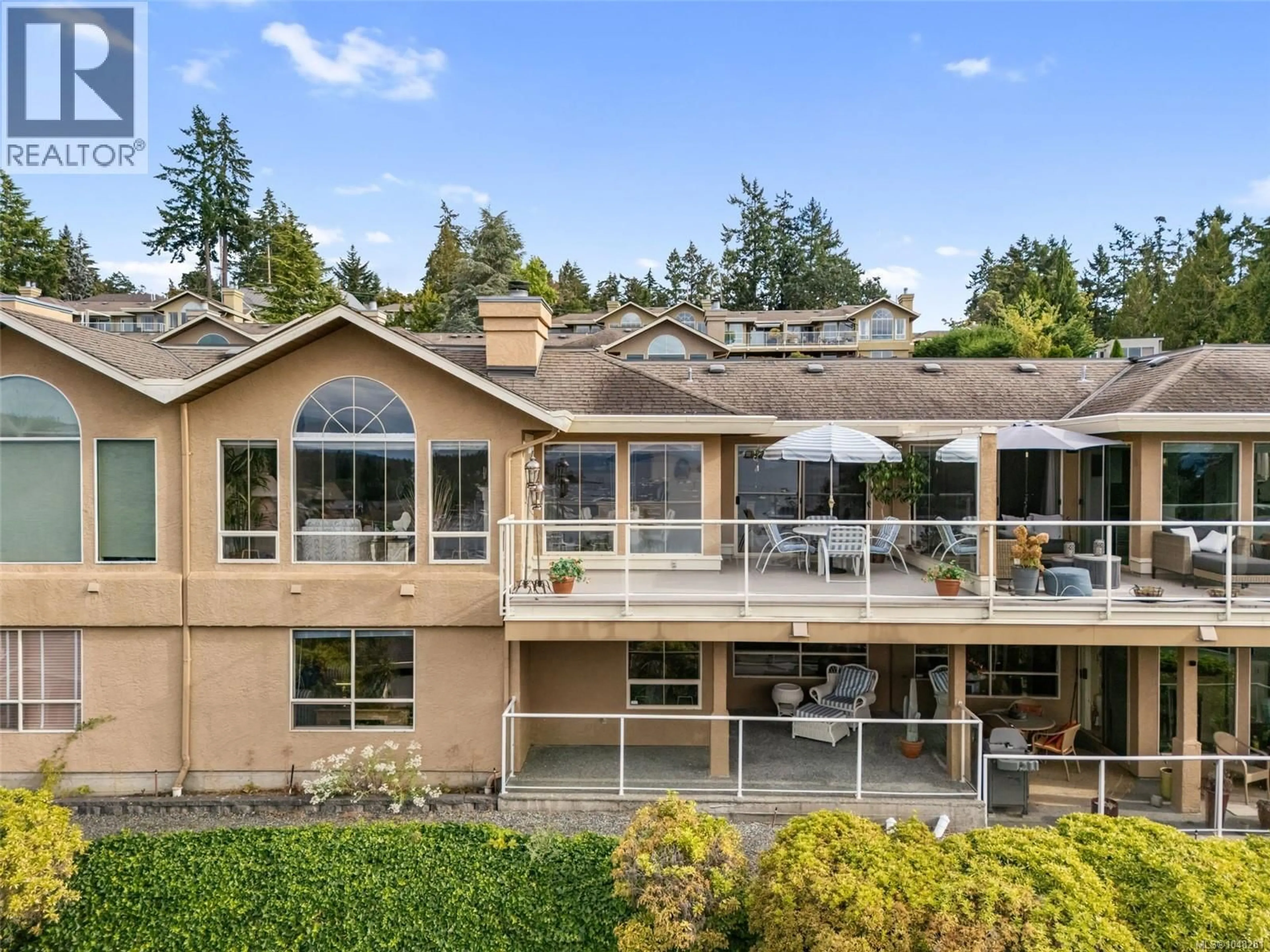 A pic from outside/outdoor area/front of a property/back of a property/a pic from drone, unknown for 504 - 6880 WALLACE DRIVE, Central Saanich British Columbia V8M1N8