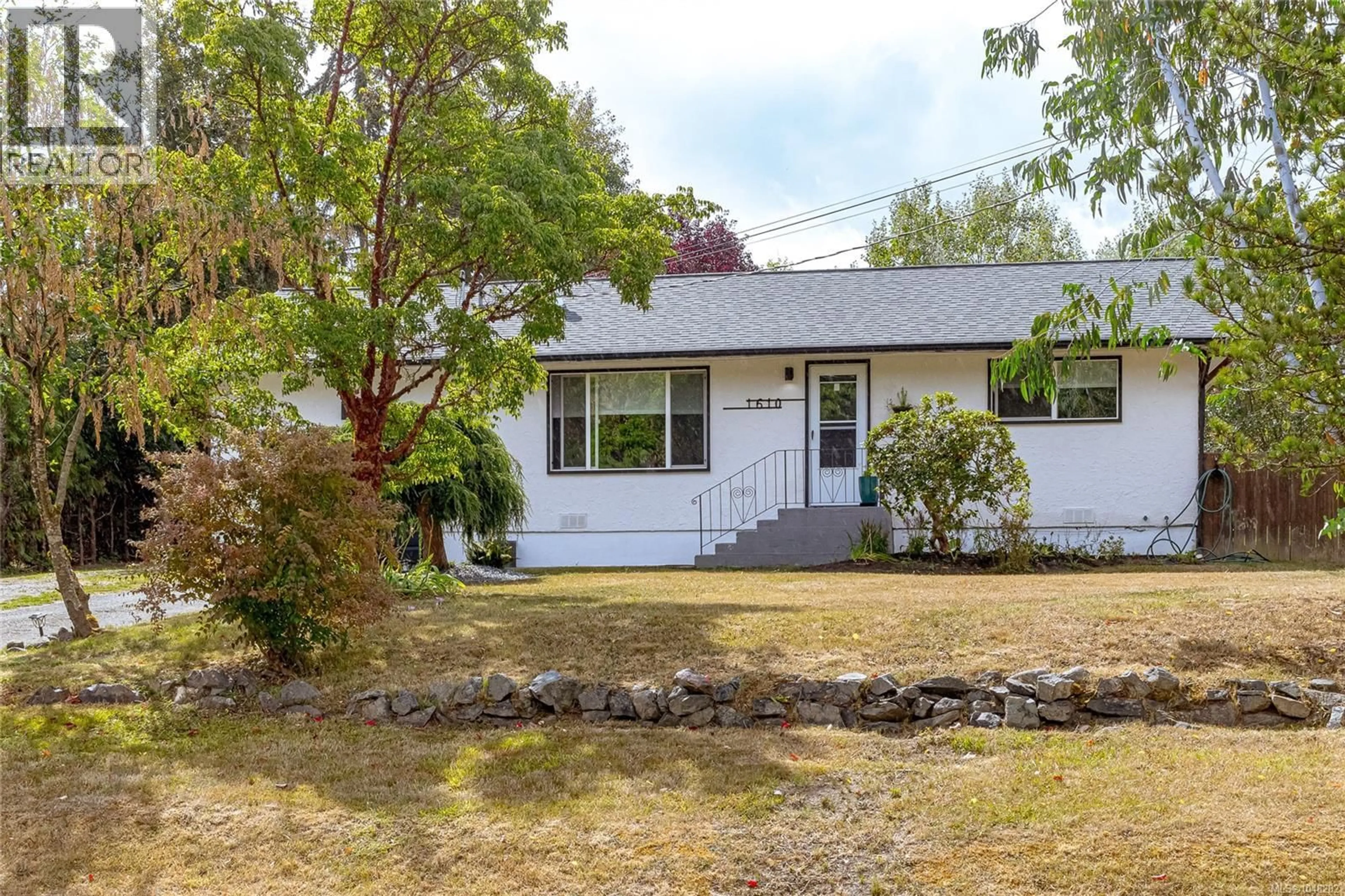 Home with vinyl exterior material, street for 1610 GLEN ROAD, Cowichan Bay British Columbia V0R1N1