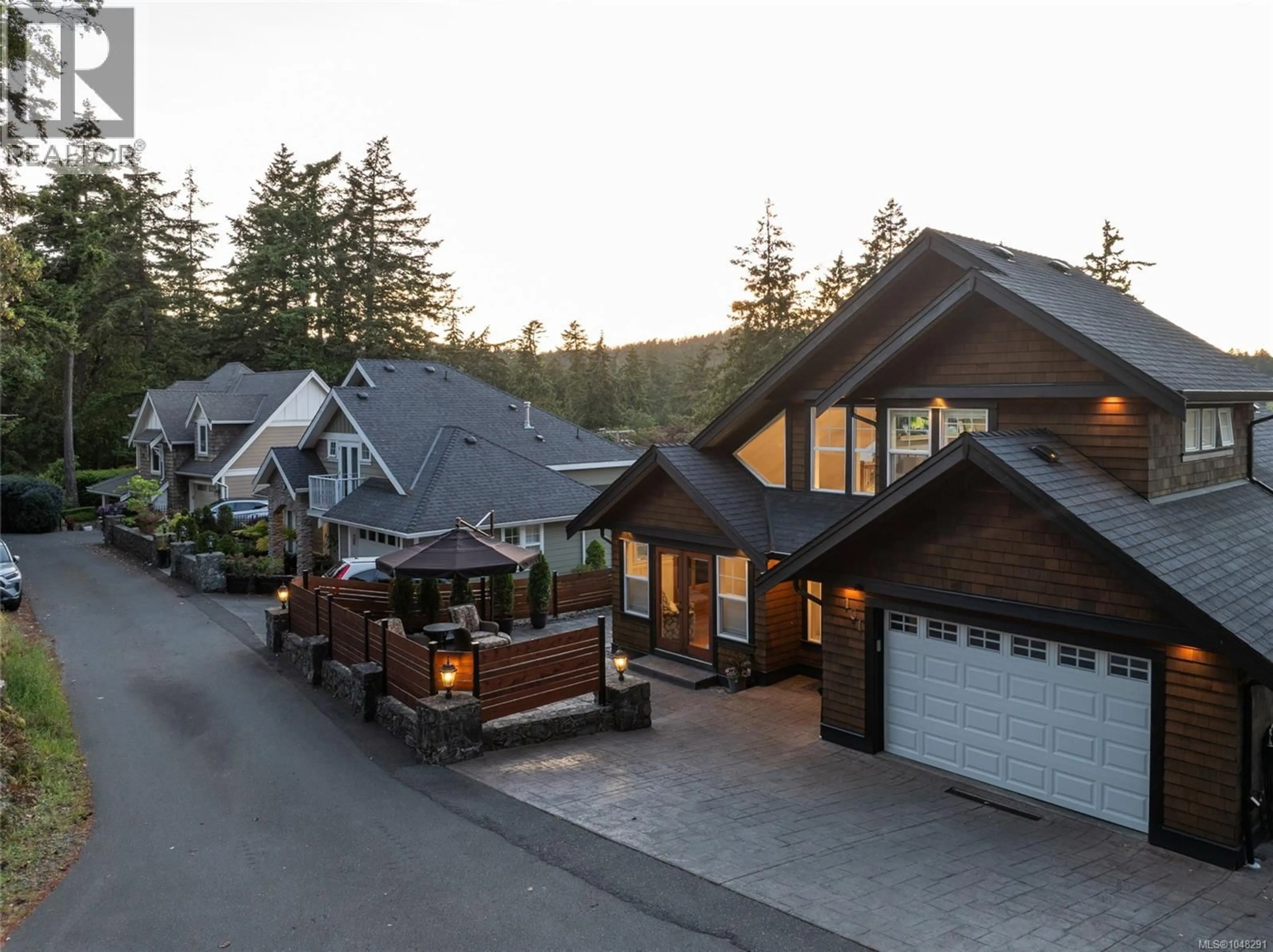 A pic from outside/outdoor area/front of a property/back of a property/a pic from drone, mountain view for 101 GIBRALTAR BAY DRIVE, View Royal British Columbia V9B6H6