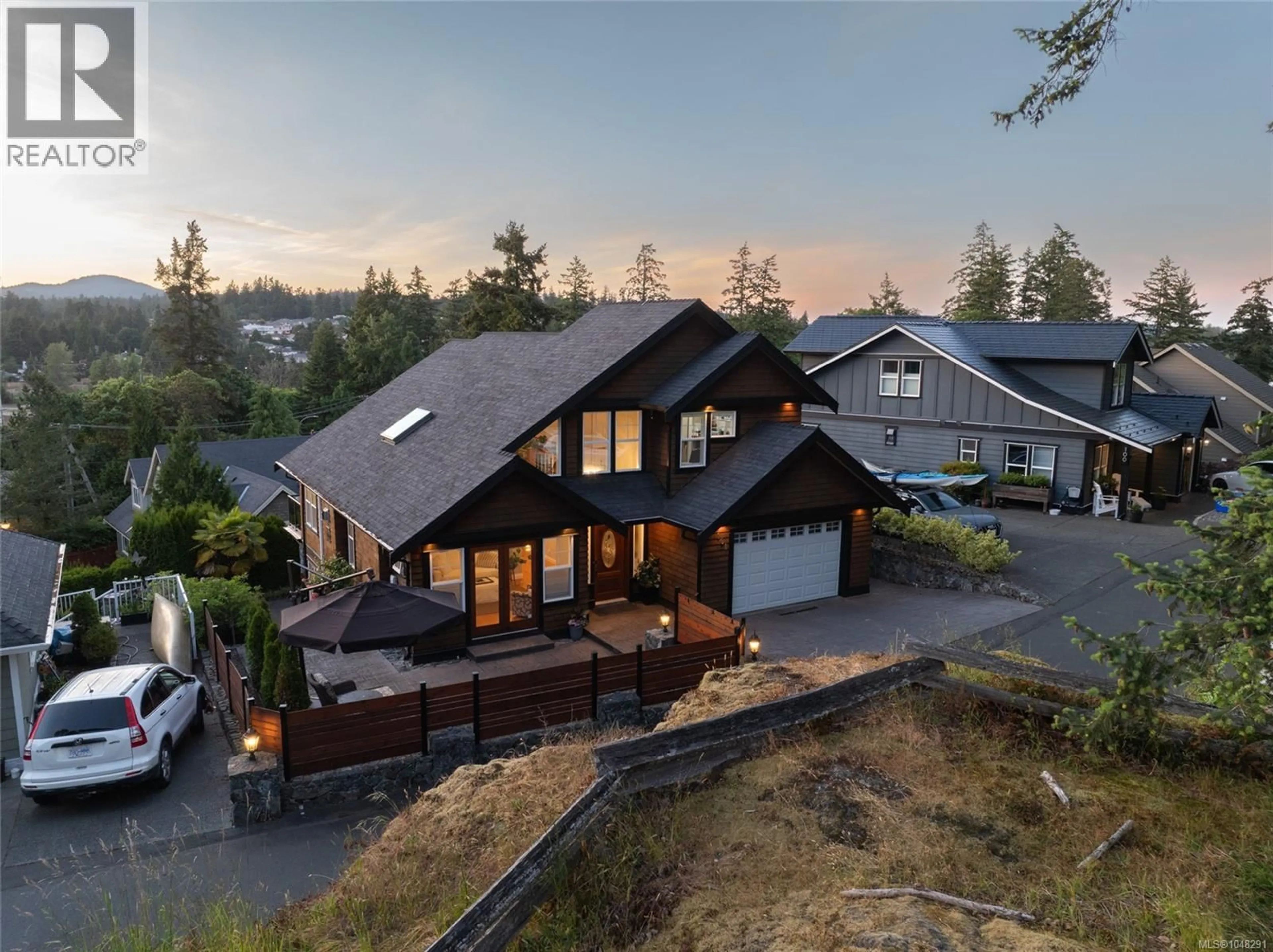 A pic from outside/outdoor area/front of a property/back of a property/a pic from drone, mountain view for 101 GIBRALTAR BAY DRIVE, View Royal British Columbia V9B6H6