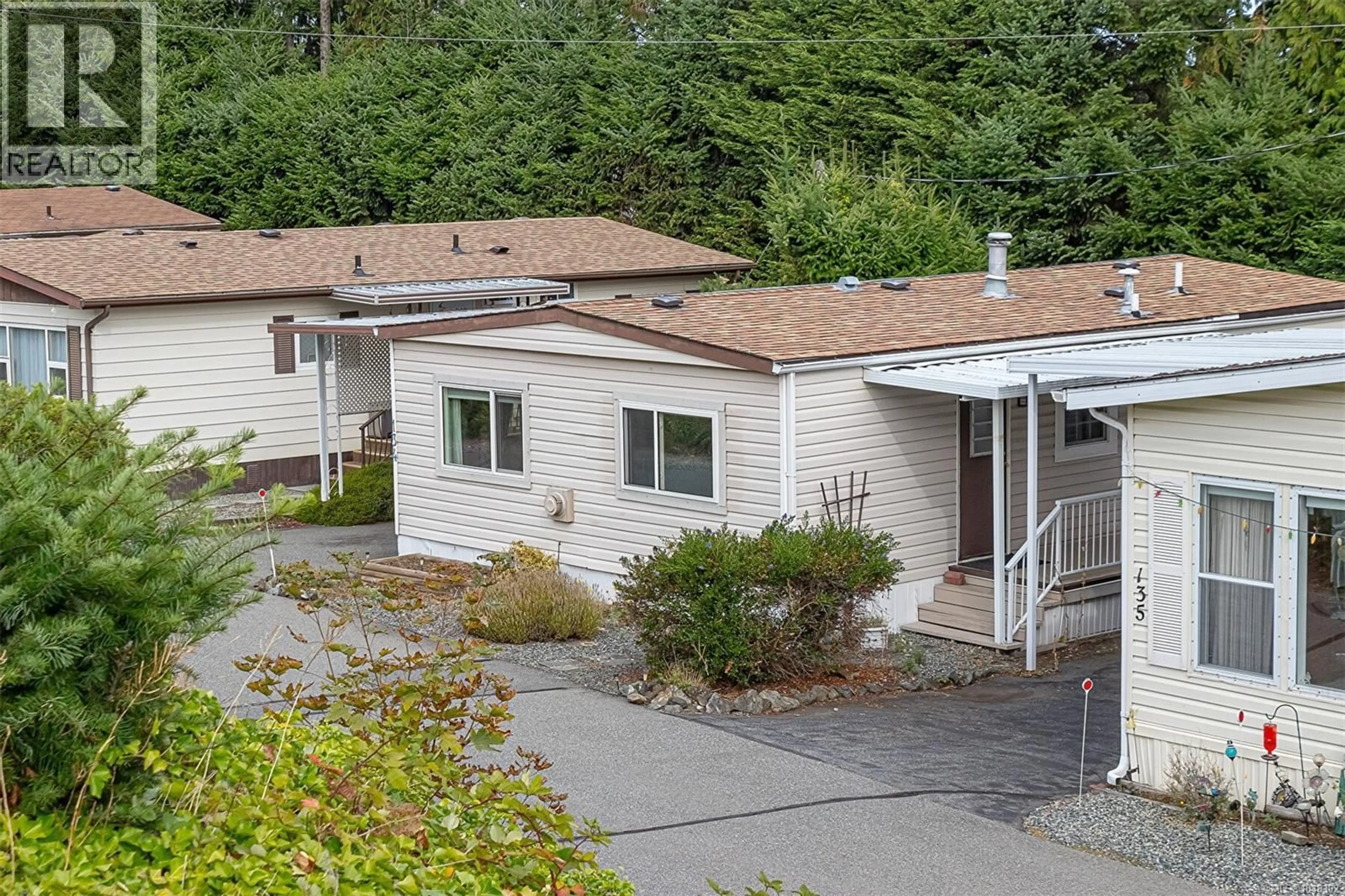 A pic from outside/outdoor area/front of a property/back of a property/a pic from drone, street for 134 - 6325 METRAL DRIVE SOUTH, Nanaimo British Columbia V9T6P9