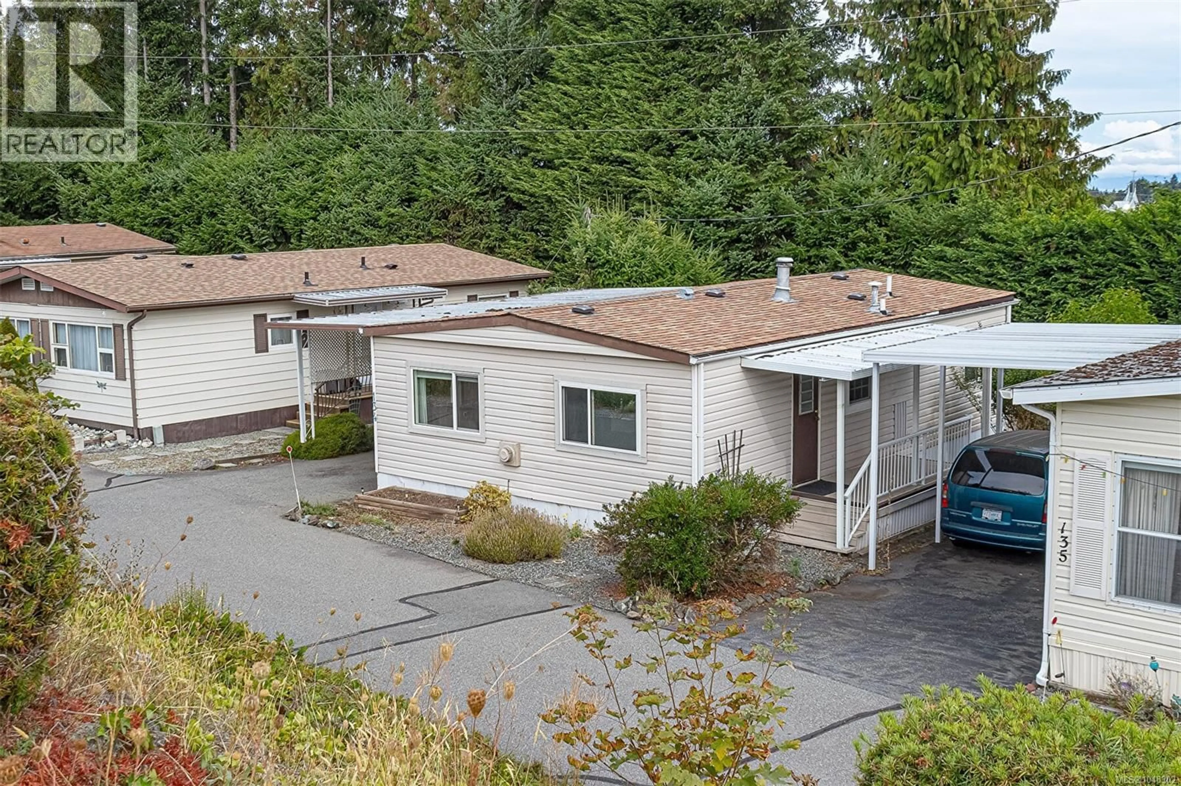 A pic from outside/outdoor area/front of a property/back of a property/a pic from drone, unknown for 134 - 6325 METRAL DRIVE SOUTH, Nanaimo British Columbia V9T6P9