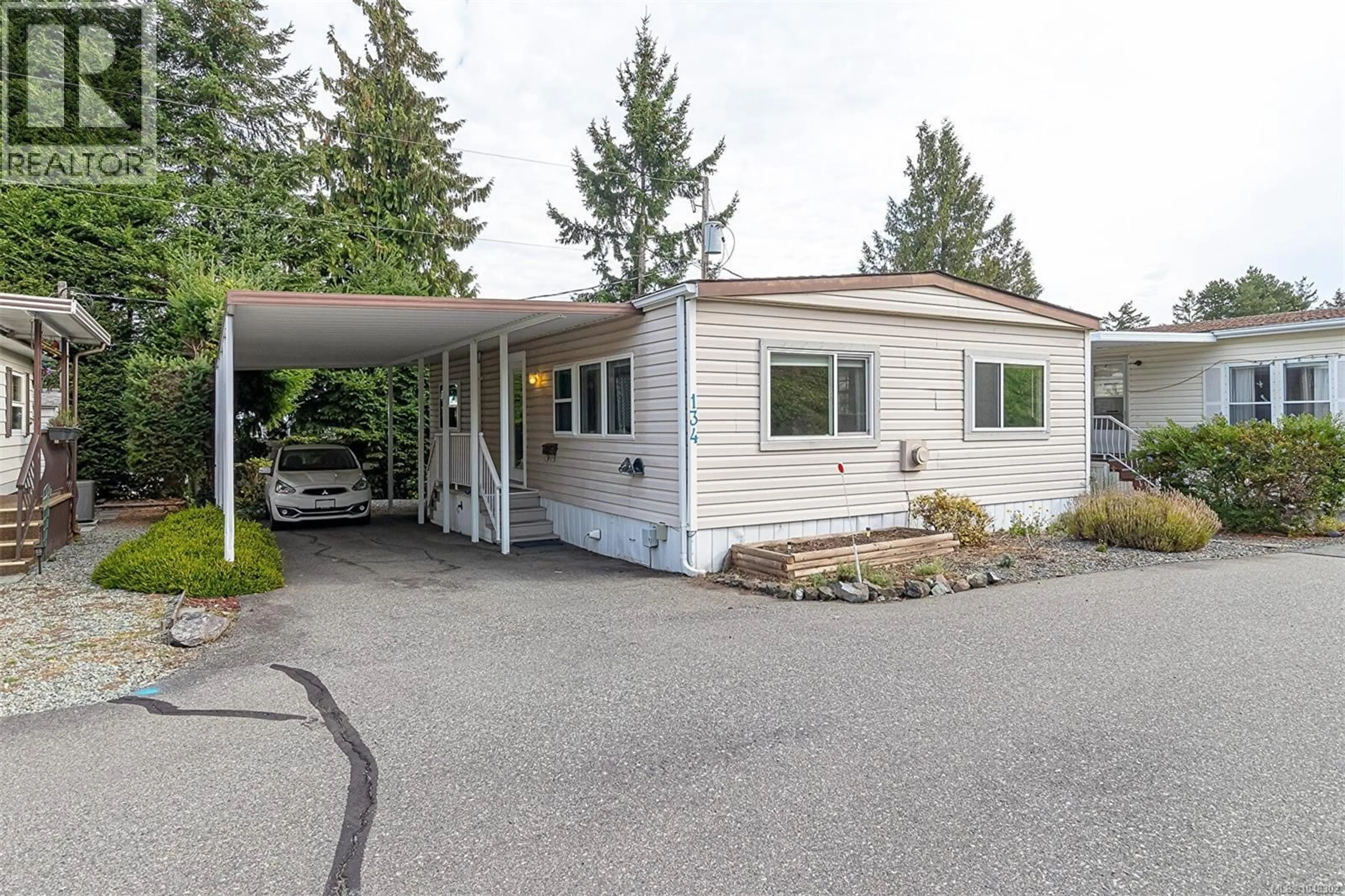 Home with vinyl exterior material, street for 134 - 6325 METRAL DRIVE SOUTH, Nanaimo British Columbia V9T6P9