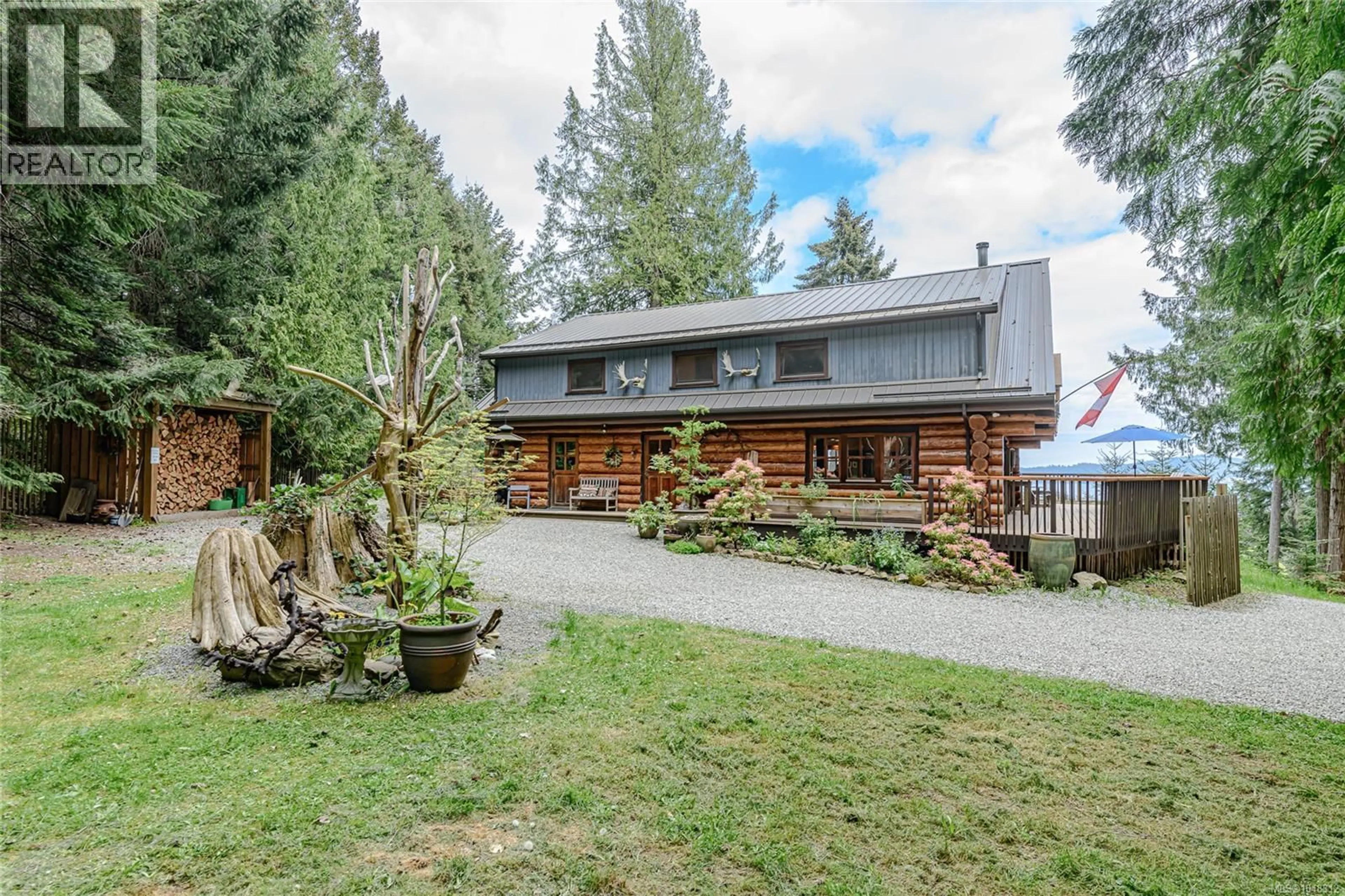 A pic from outside/outdoor area/front of a property/back of a property/a pic from drone, mountain view for 129 MARIKO PLACE, Salt Spring British Columbia V8K1E1