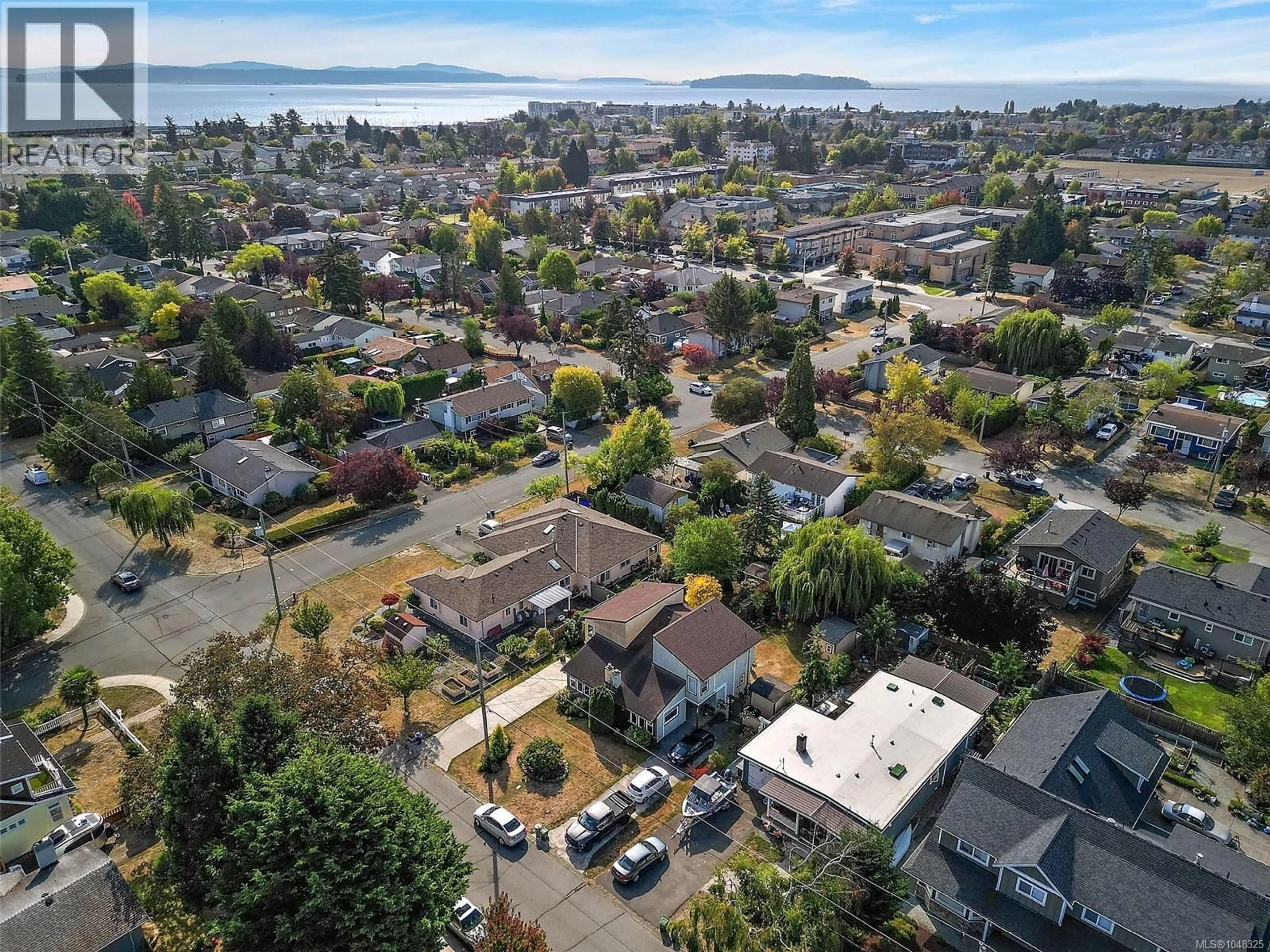 A pic from outside/outdoor area/front of a property/back of a property/a pic from drone, mountain view for 2253 MALAVIEW AVENUE, Sidney British Columbia V8L2E6