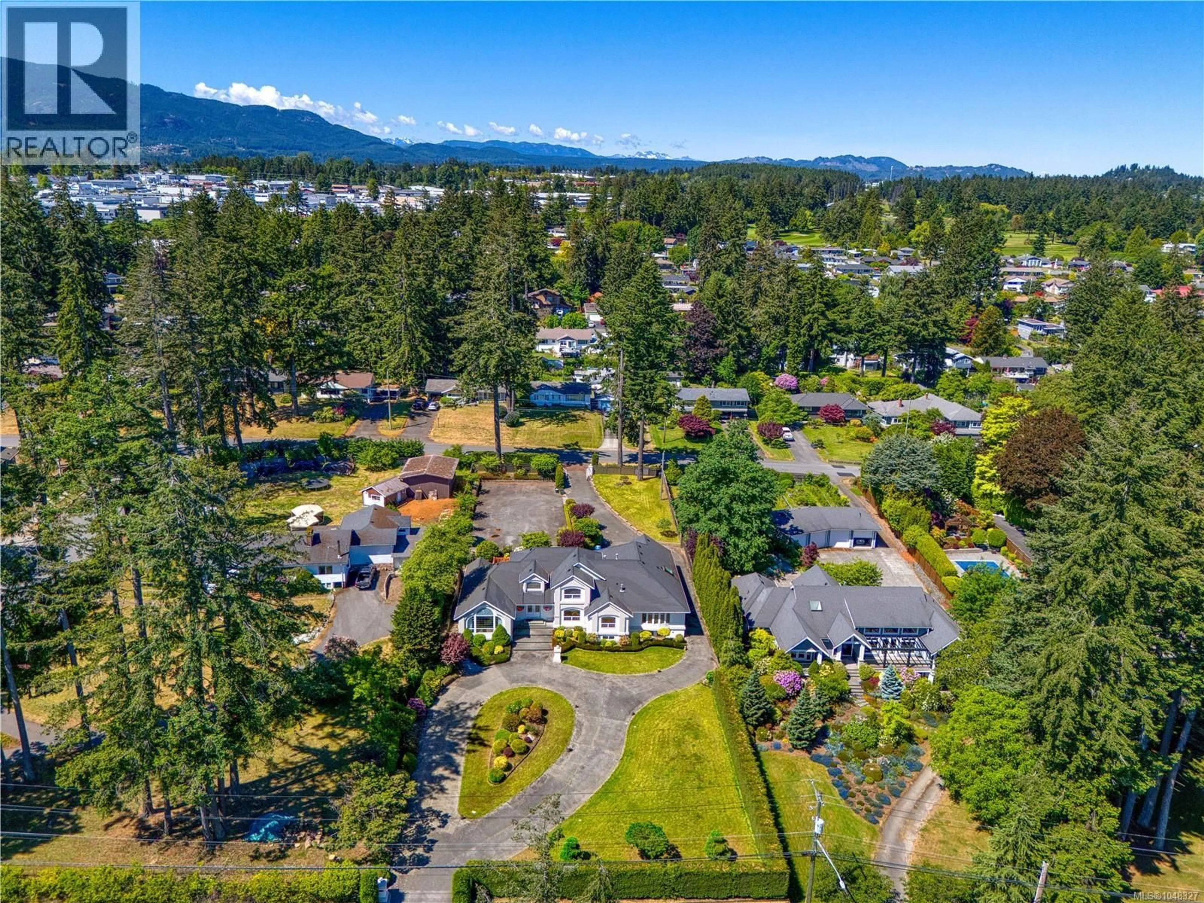 A pic from outside/outdoor area/front of a property/back of a property/a pic from drone, mountain view for 2415 DEPARTURE BAY ROAD, Nanaimo British Columbia V9S3W1