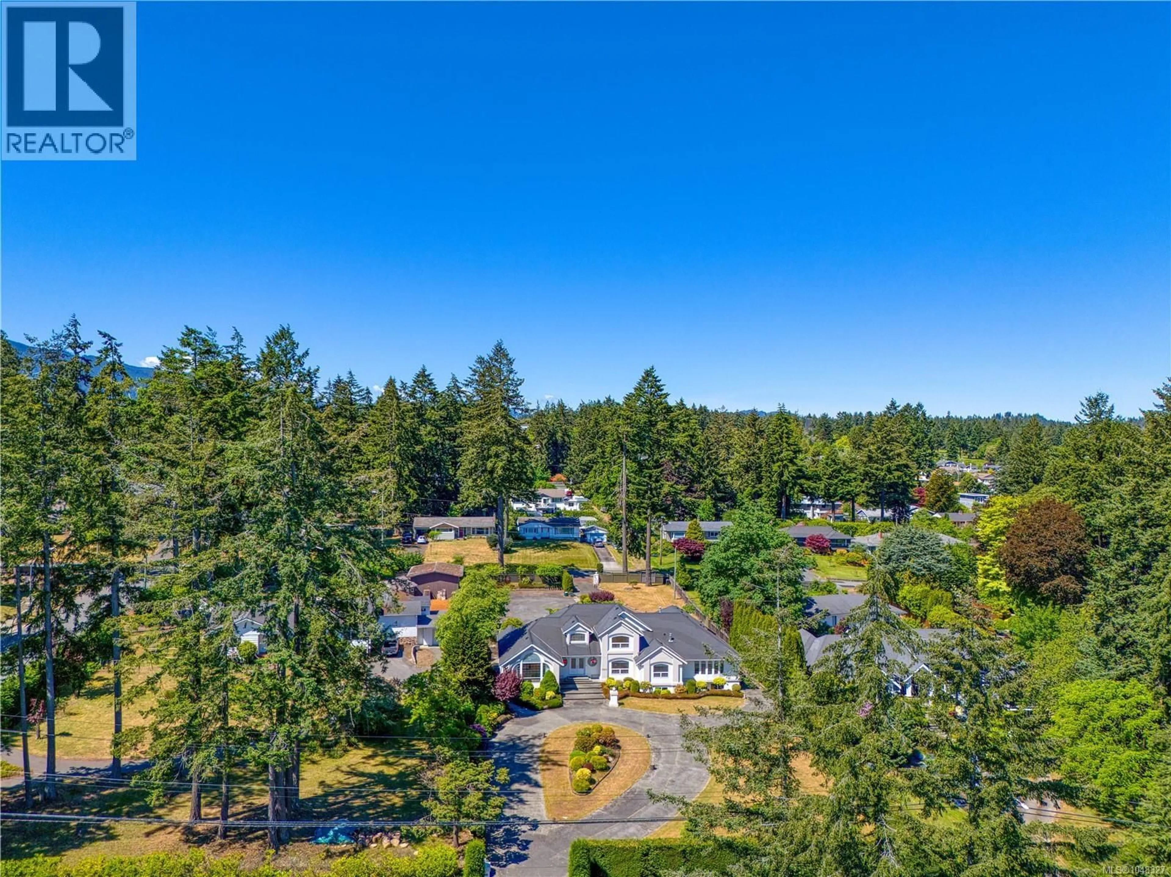 A pic from outside/outdoor area/front of a property/back of a property/a pic from drone, forest/trees view for 2415 DEPARTURE BAY ROAD, Nanaimo British Columbia V9S3W1