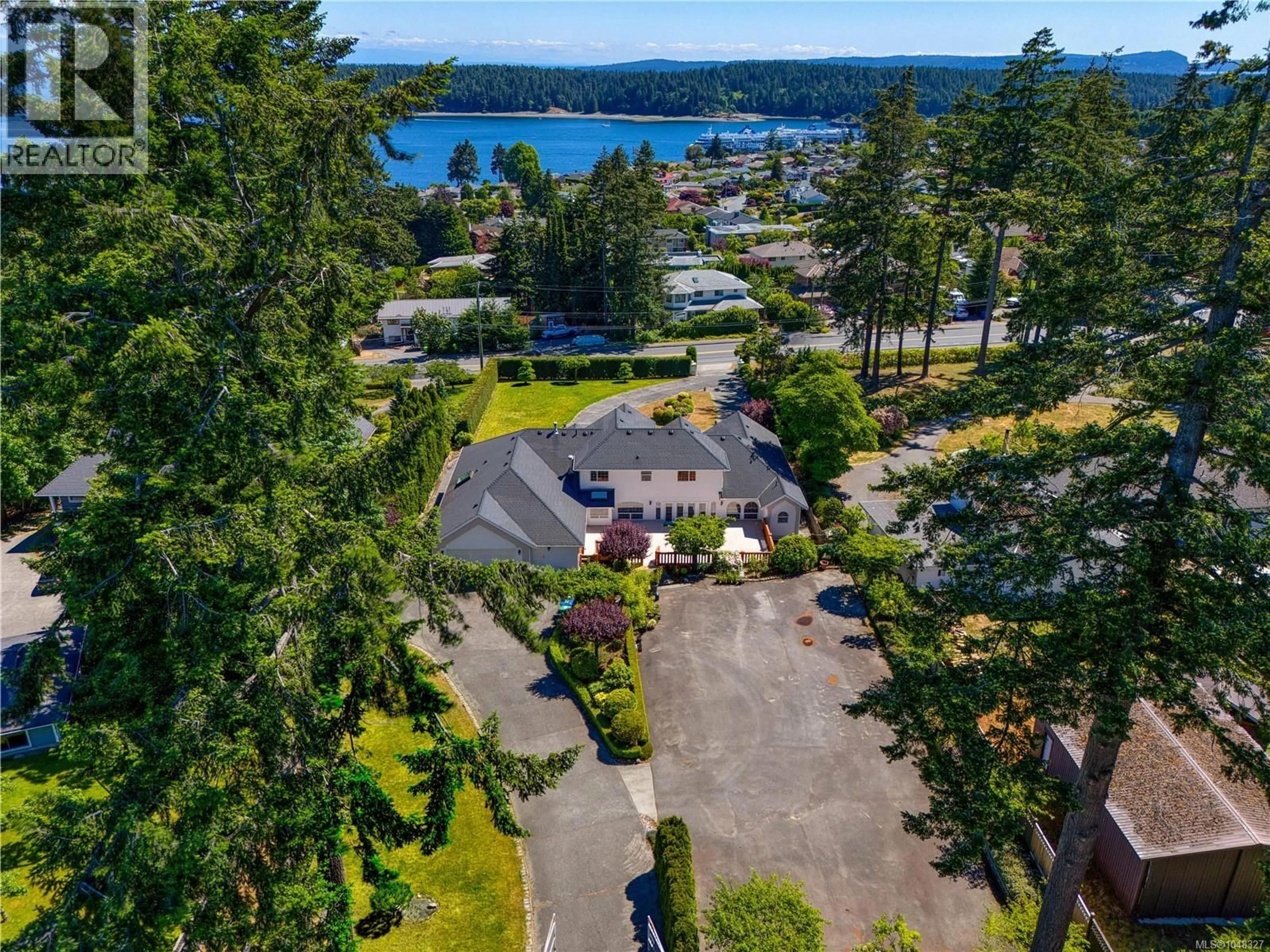 A pic from outside/outdoor area/front of a property/back of a property/a pic from drone, water/lake/river/ocean view for 2415 DEPARTURE BAY ROAD, Nanaimo British Columbia V9S3W1