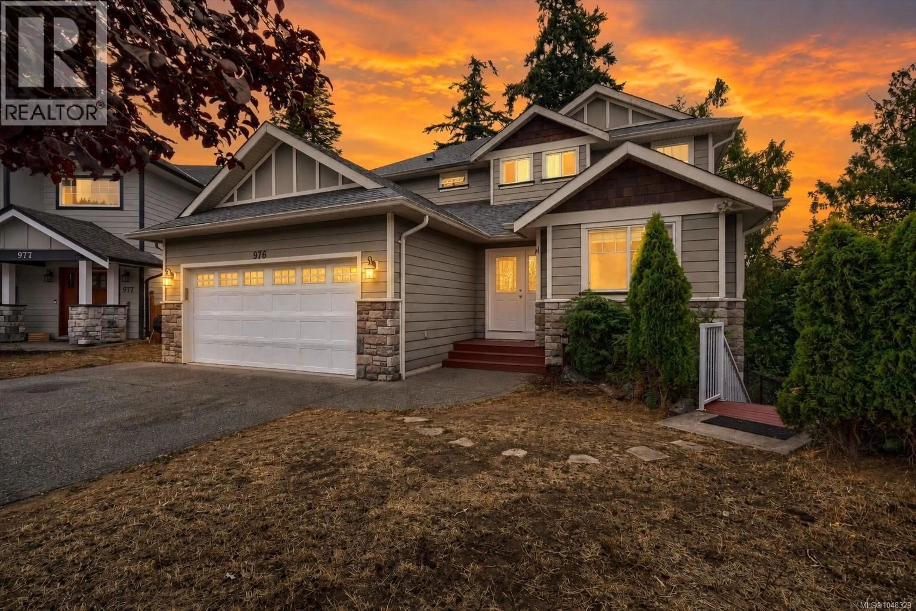 Home with vinyl exterior material, street for 976 WILD BLOSSOM COURT, Langford British Columbia V9C4M8