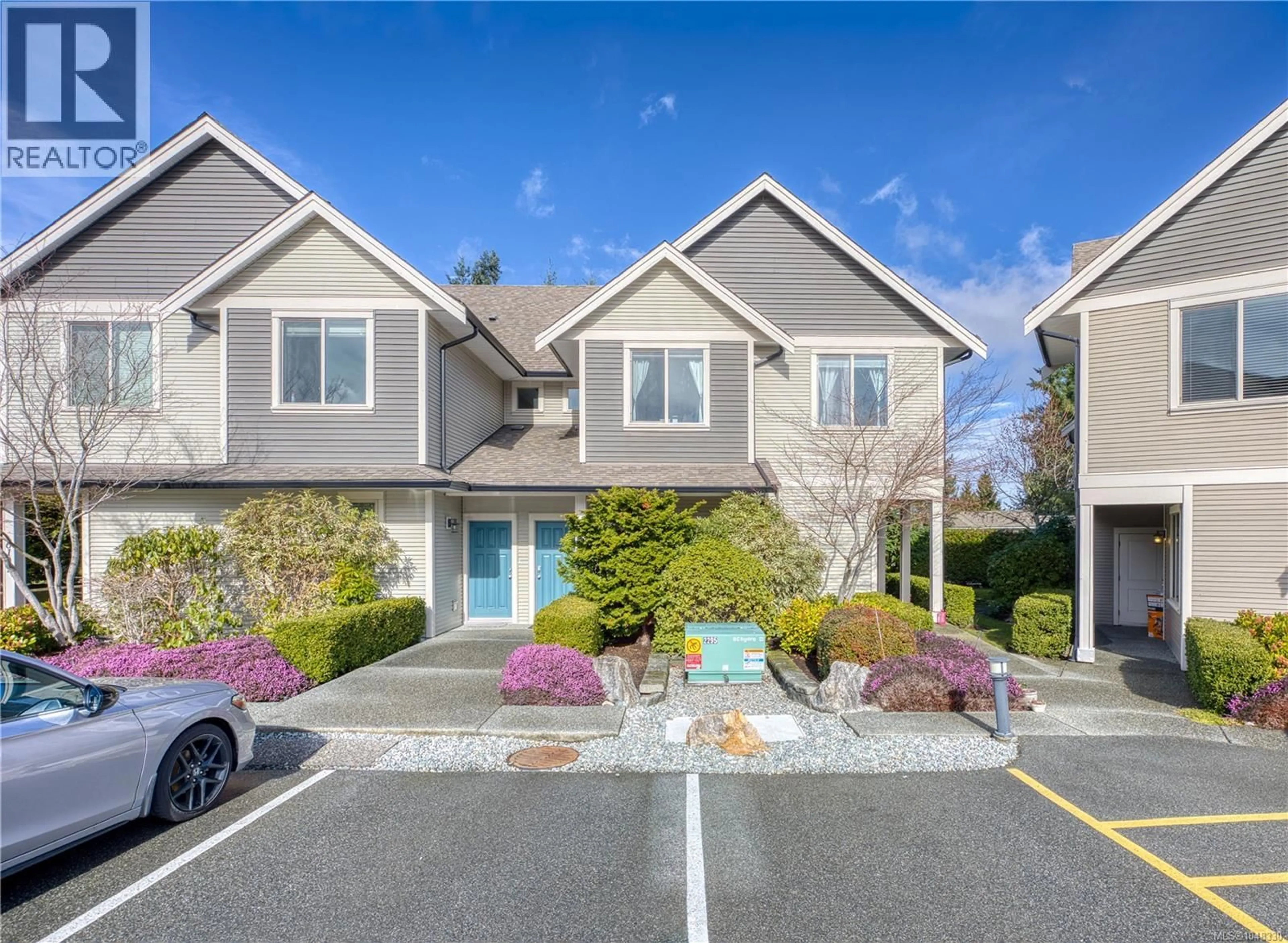 Home with vinyl exterior material, street for 6103 THYME PLACE, Nanaimo British Columbia V9V1M1