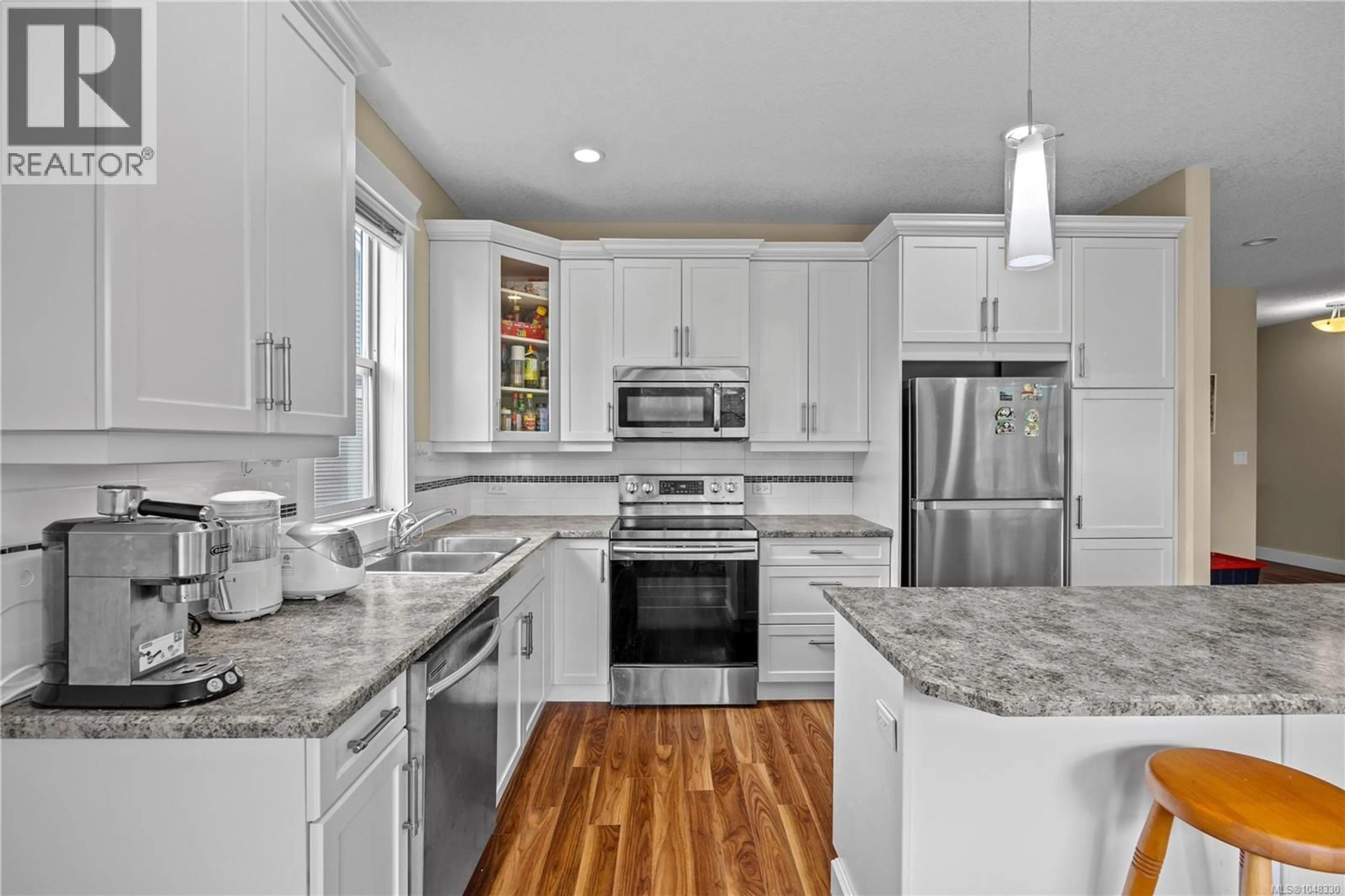 Open concept kitchen, ceramic/tile floor for 6103 THYME PLACE, Nanaimo British Columbia V9V1M1