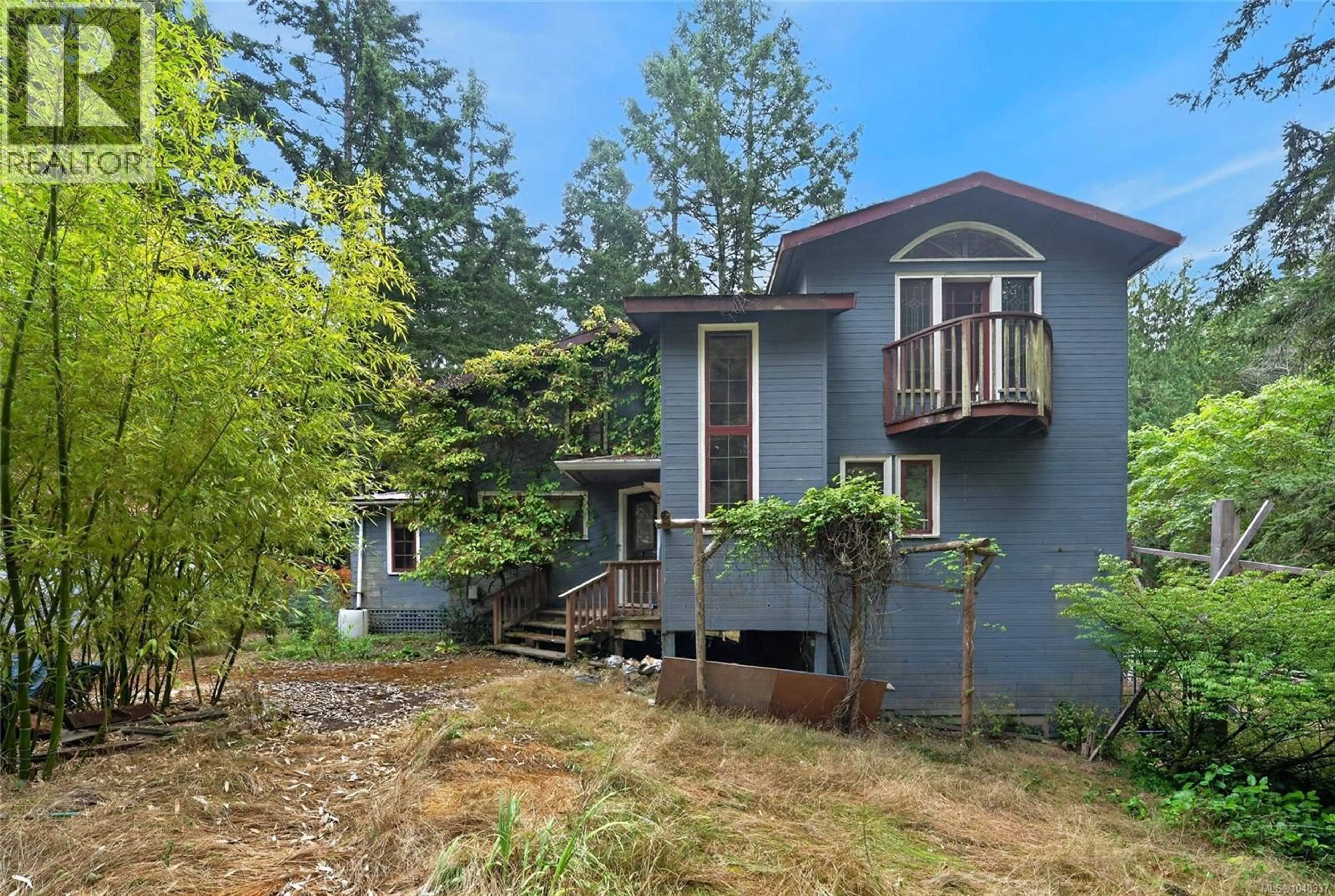 A pic from outside/outdoor area/front of a property/back of a property/a pic from drone, forest/trees view for 3319 DECOURCY DRIVE, Nanaimo British Columbia V9G1E4