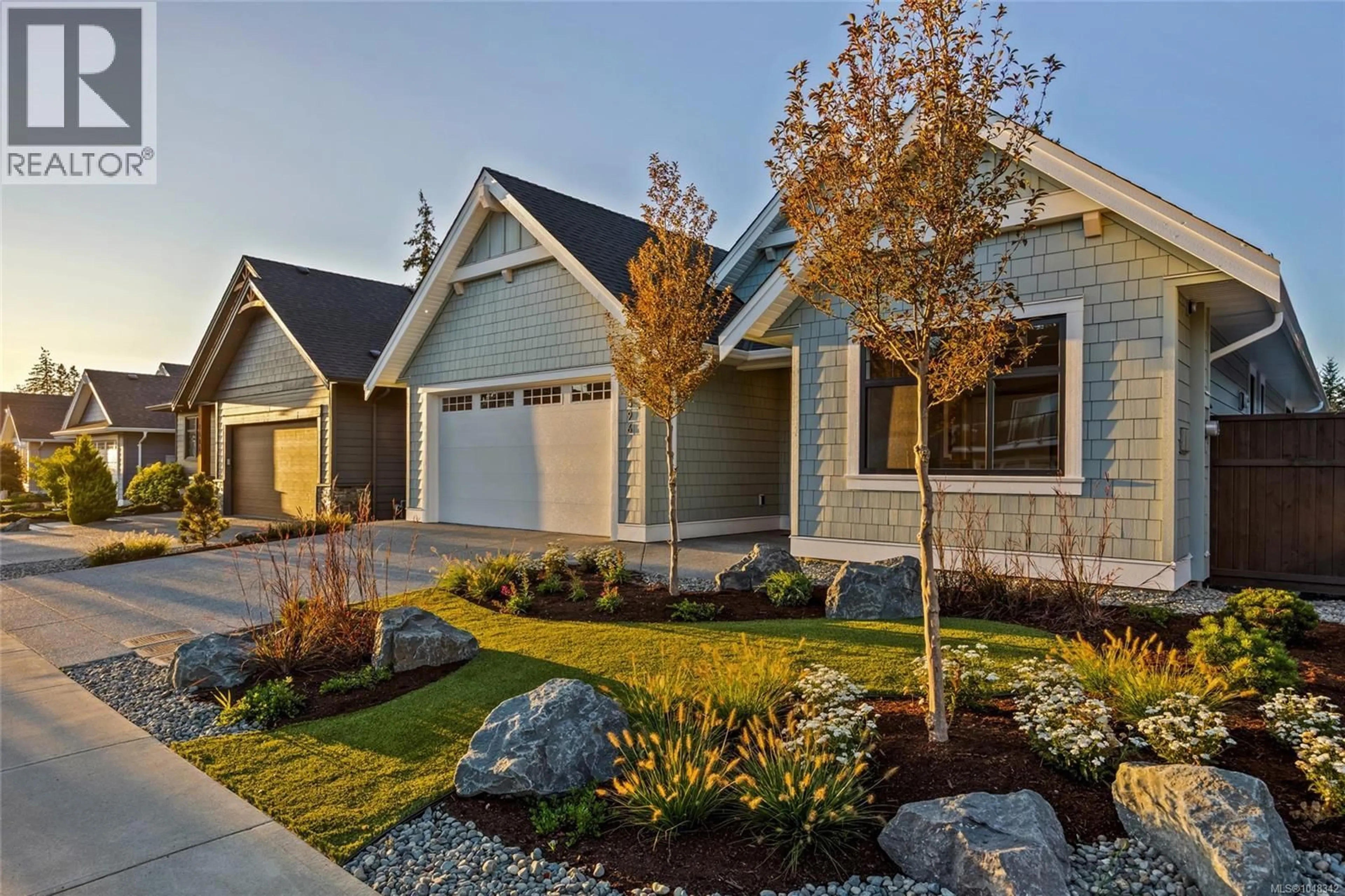 Home with vinyl exterior material, street for 1596 CROWN ISLE BOULEVARD, Courtenay British Columbia V9N9X5