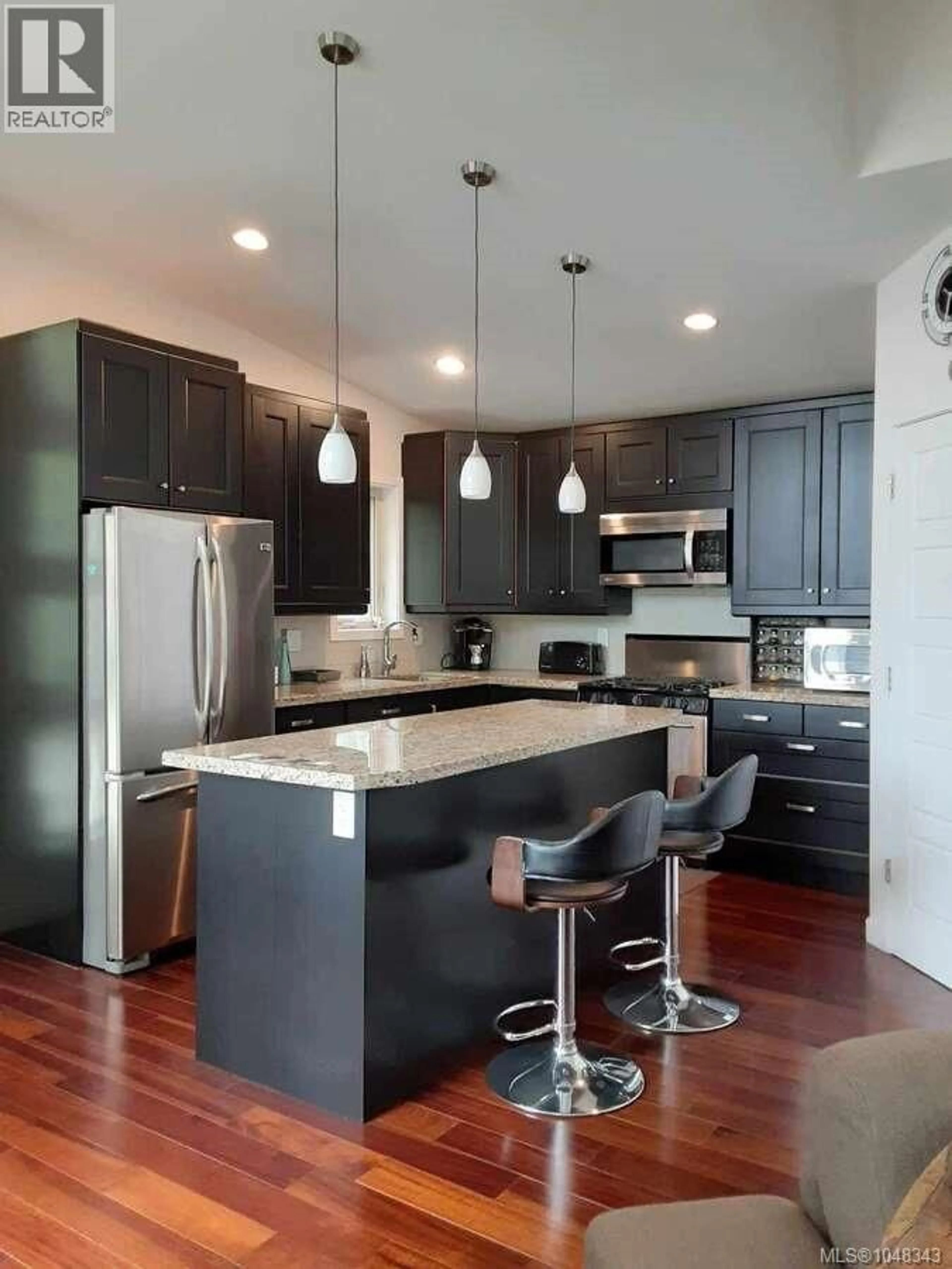 Contemporary kitchen, wood/laminate floor for 733 BERRY POINT ROAD, Gabriola Island British Columbia V0R1X1