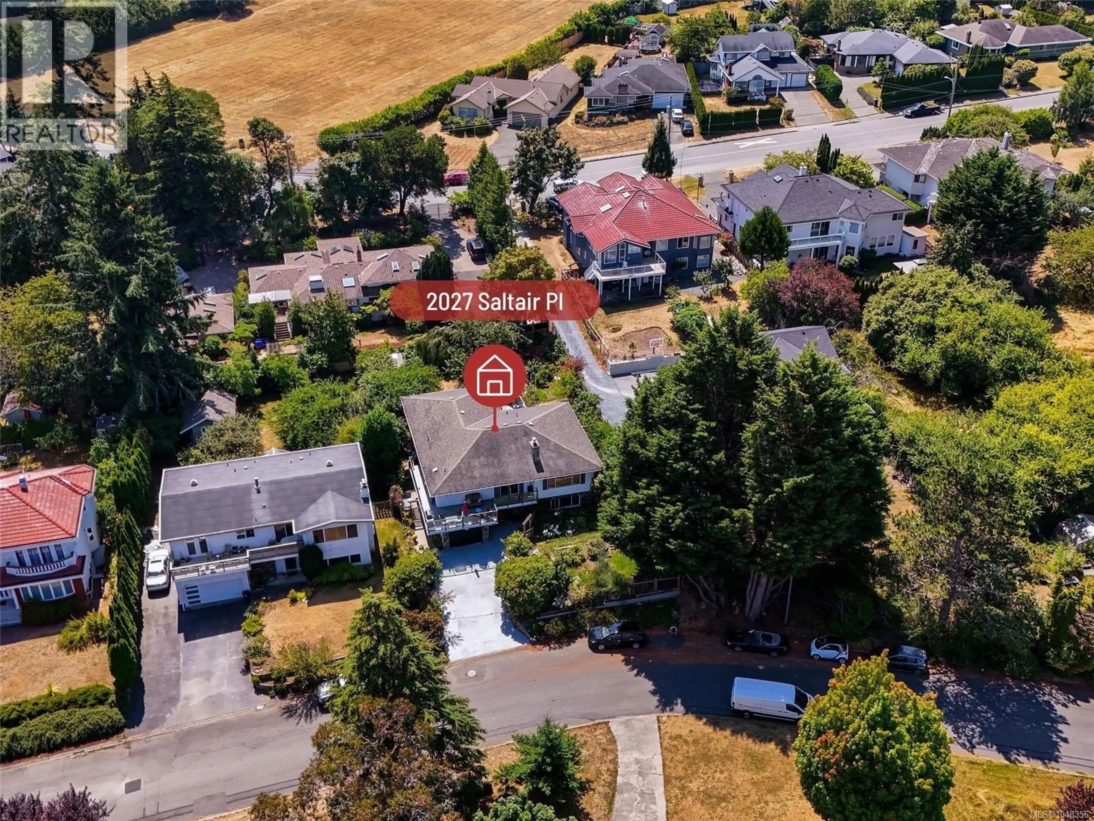 A pic from outside/outdoor area/front of a property/back of a property/a pic from drone, street for 2027 SALTAIR PLACE, Saanich British Columbia V8N4S4