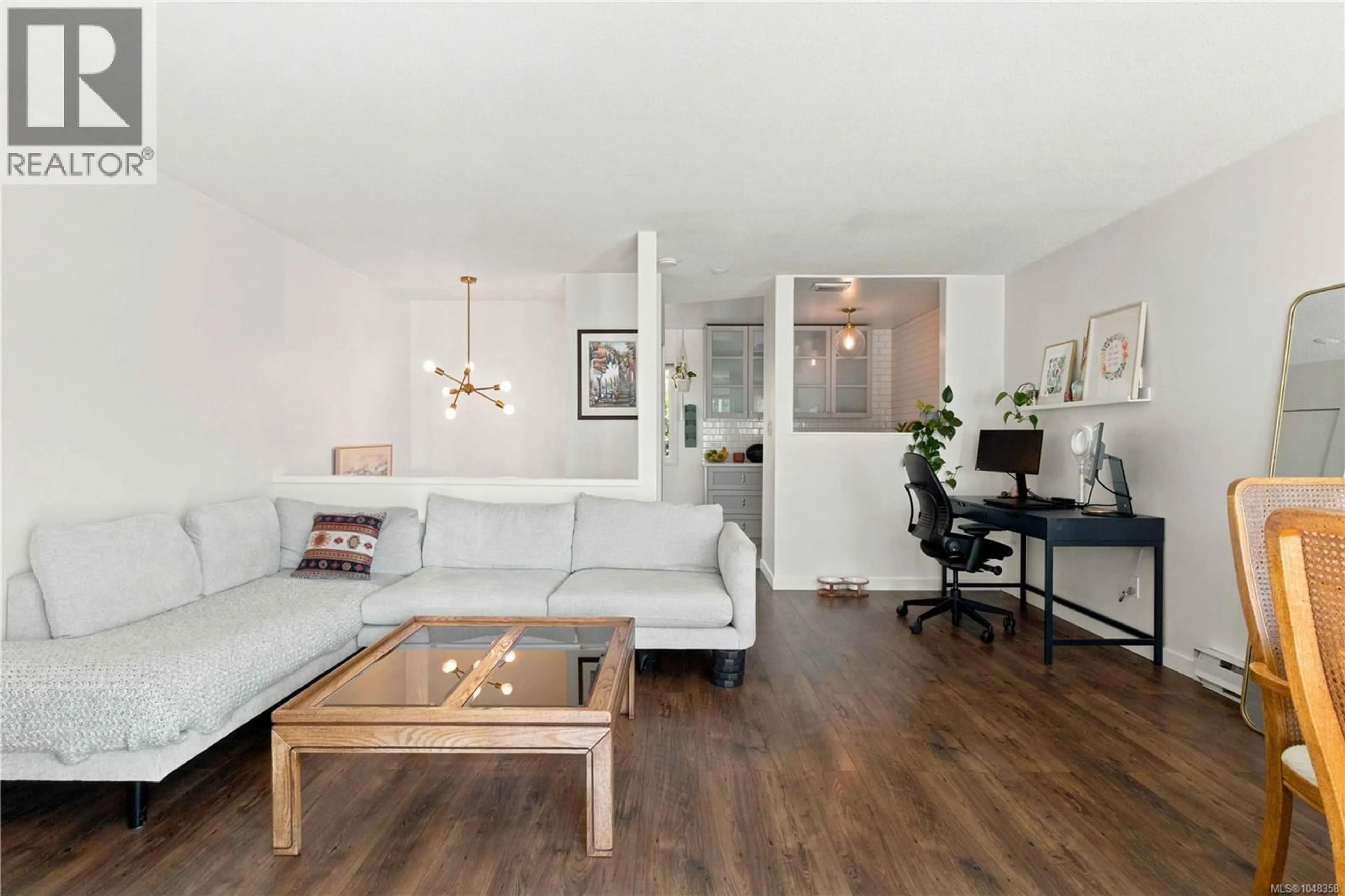 Living room with furniture, wood/laminate floor for 2 - 210 DOUGLAS STREET, Victoria British Columbia V8V2P2