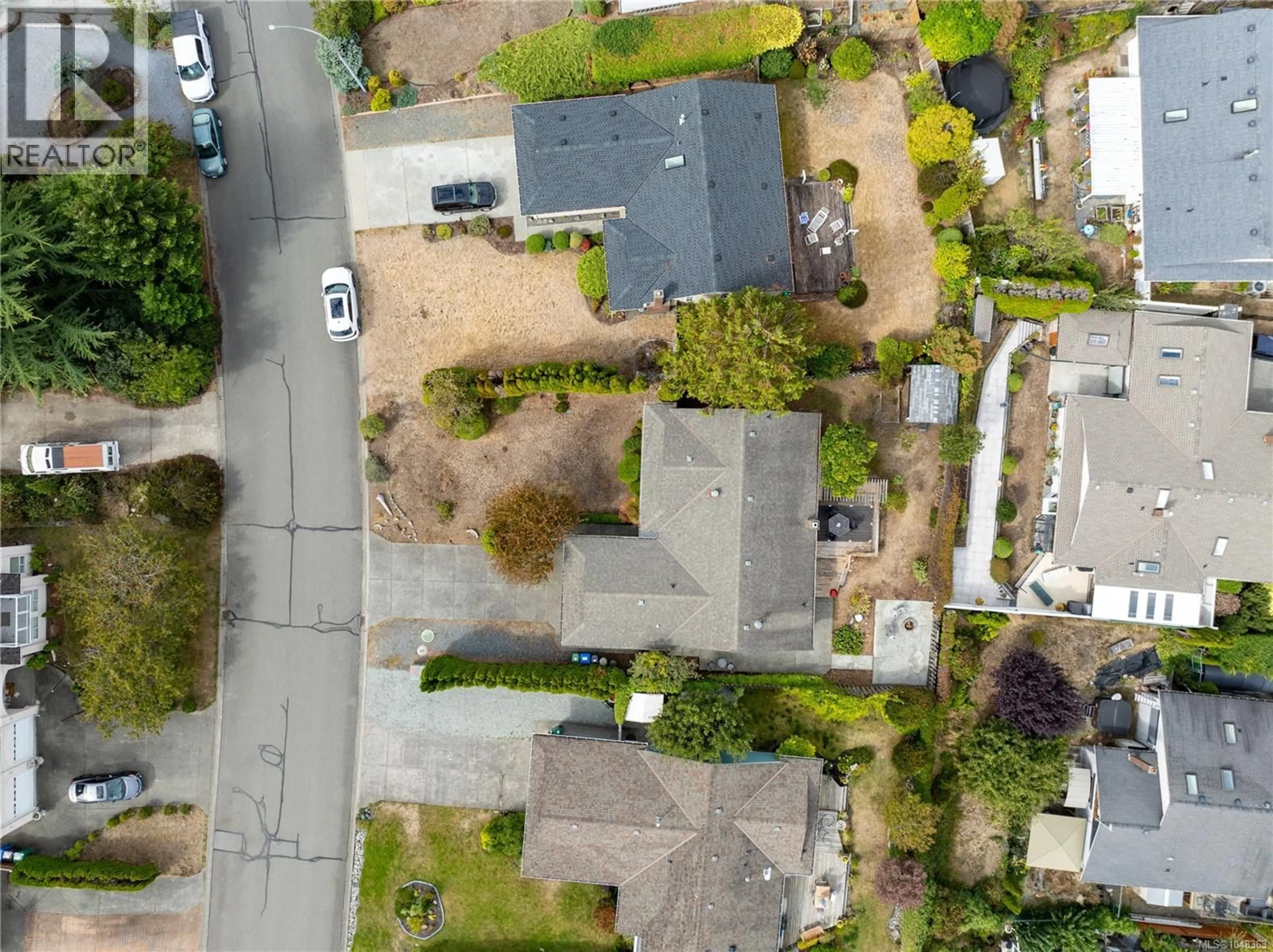A pic from outside/outdoor area/front of a property/back of a property/a pic from drone, street for 6218 GROVELAND DRIVE, Nanaimo British Columbia V9V1B1