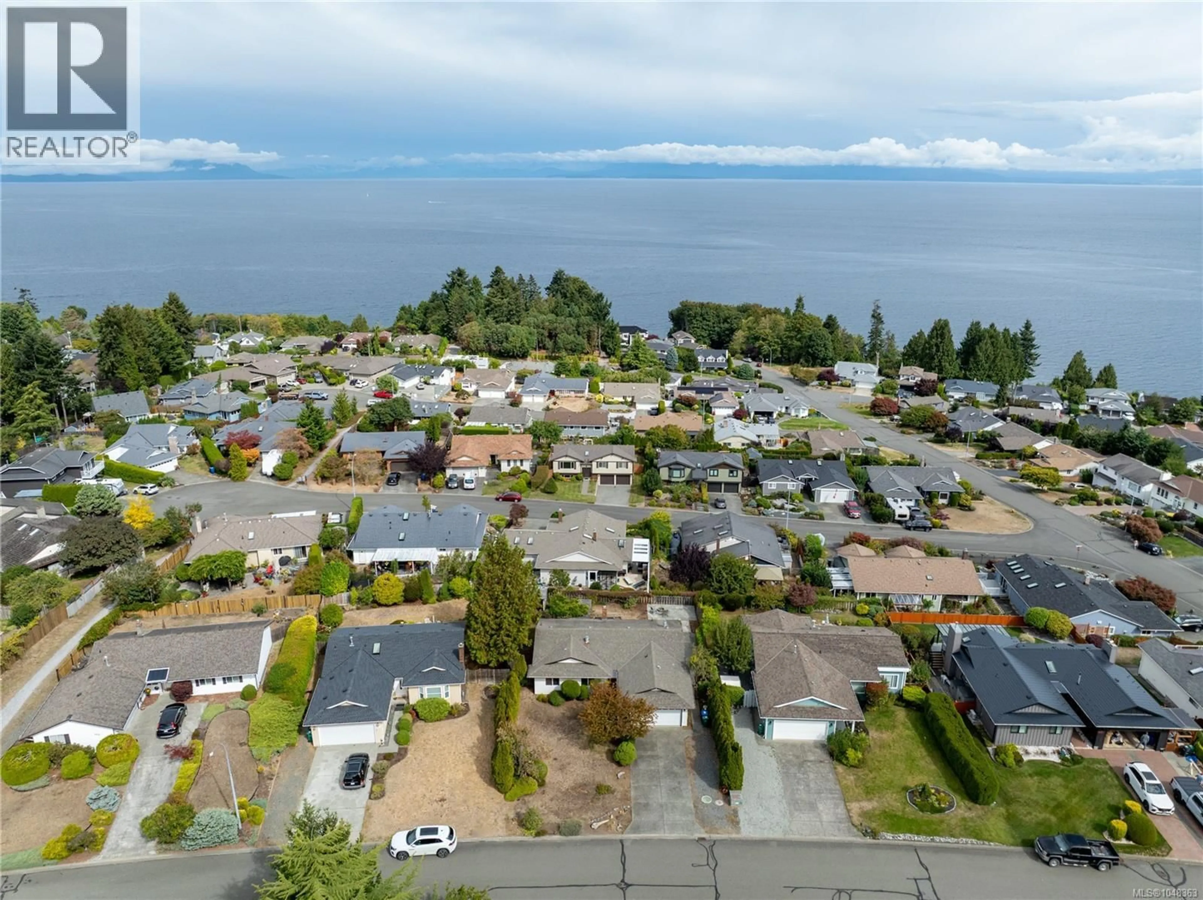 A pic from outside/outdoor area/front of a property/back of a property/a pic from drone, water/lake/river/ocean view for 6218 GROVELAND DRIVE, Nanaimo British Columbia V9V1B1