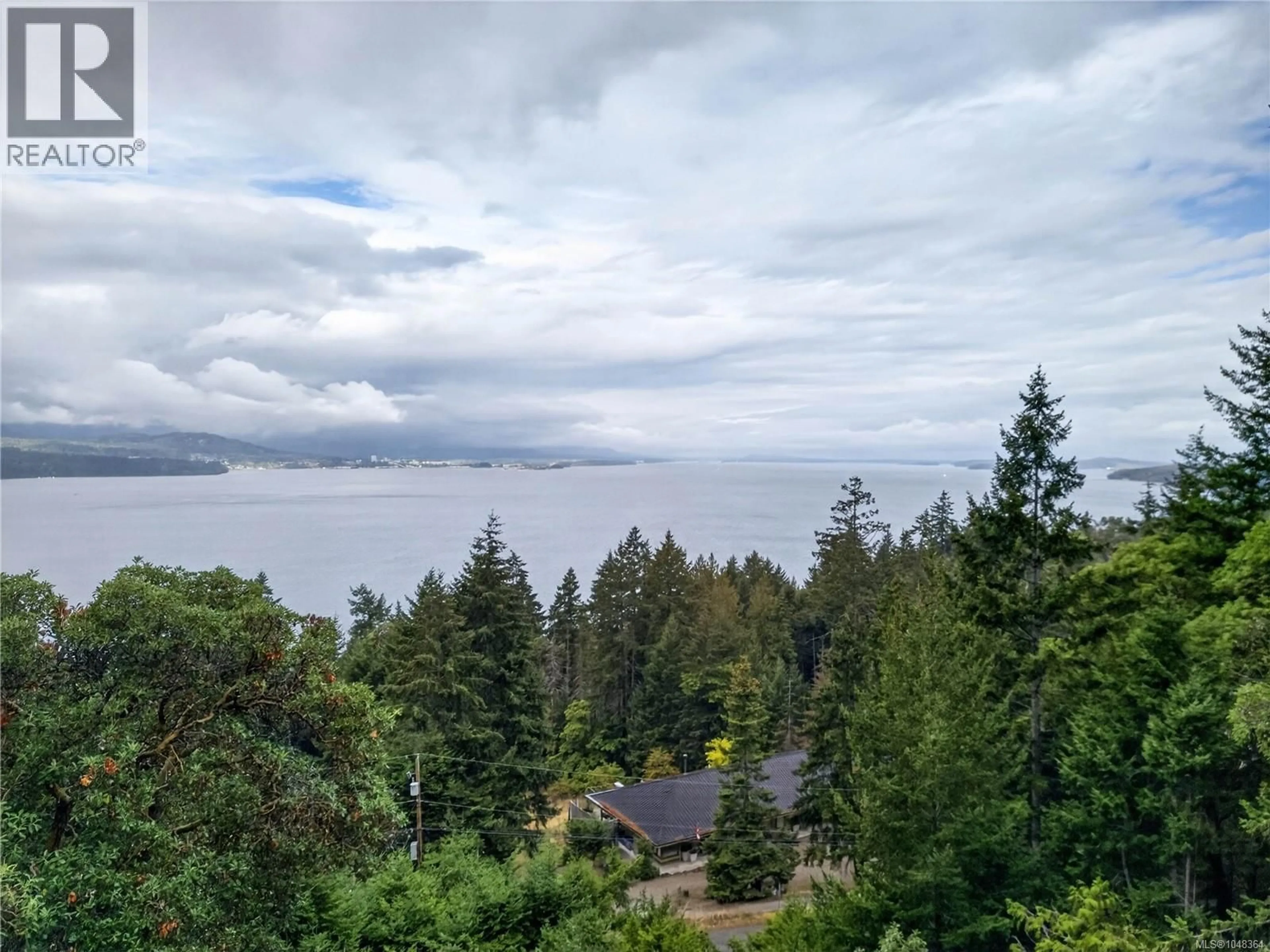 A pic from outside/outdoor area/front of a property/back of a property/a pic from drone, water/lake/river/ocean view for 321 COLLINS ROAD, Salt Spring British Columbia V8K2N1