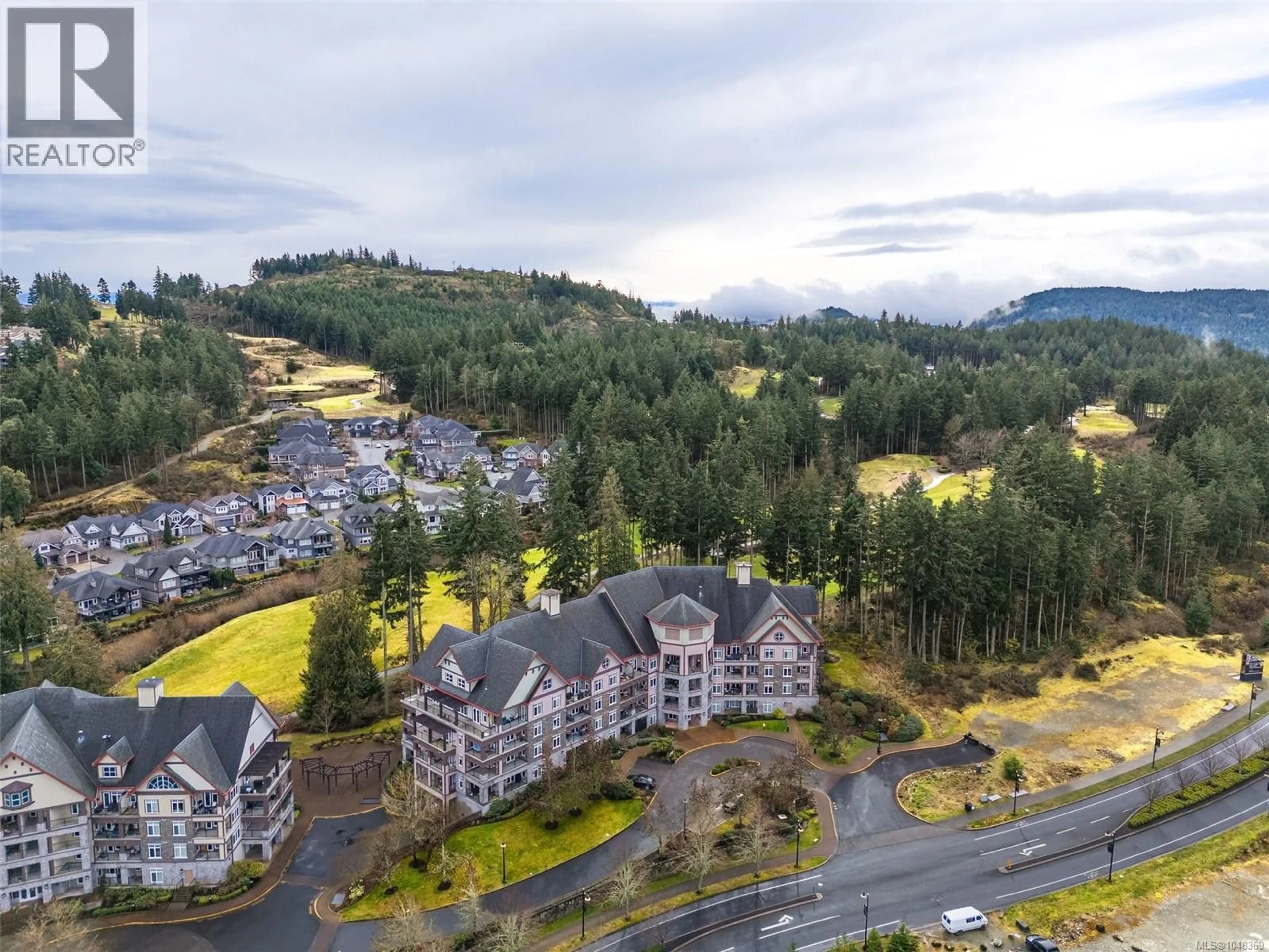A pic from outside/outdoor area/front of a property/back of a property/a pic from drone, mountain view for 419 - 1395 BEAR MOUNTAIN PARKWAY, Langford British Columbia V9B0E1