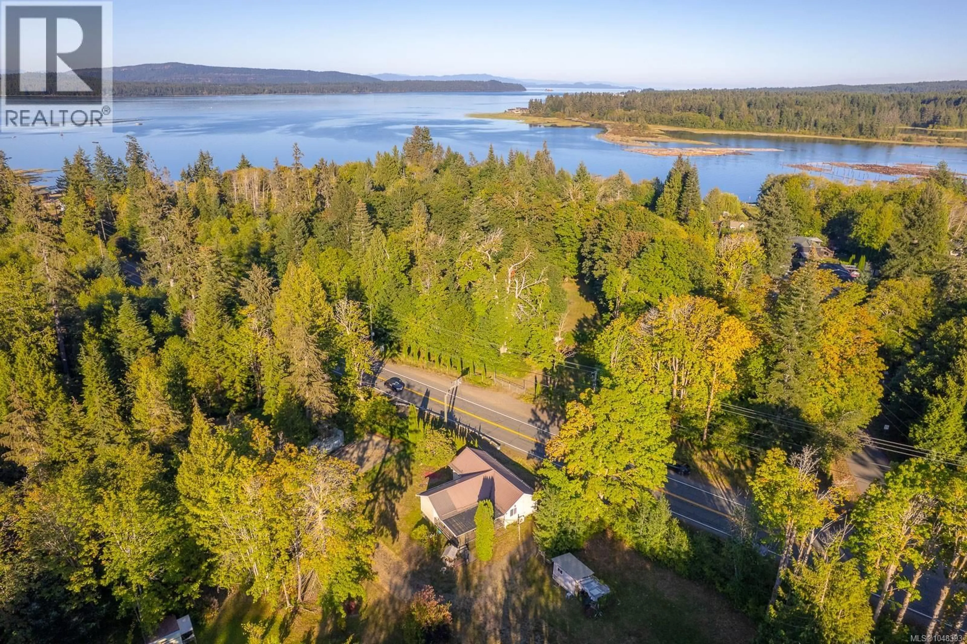 A pic from outside/outdoor area/front of a property/back of a property/a pic from drone, water/lake/river/ocean view for 8331 ISLAND HIGHWAY SOUTH, Fanny Bay British Columbia V0R1V0