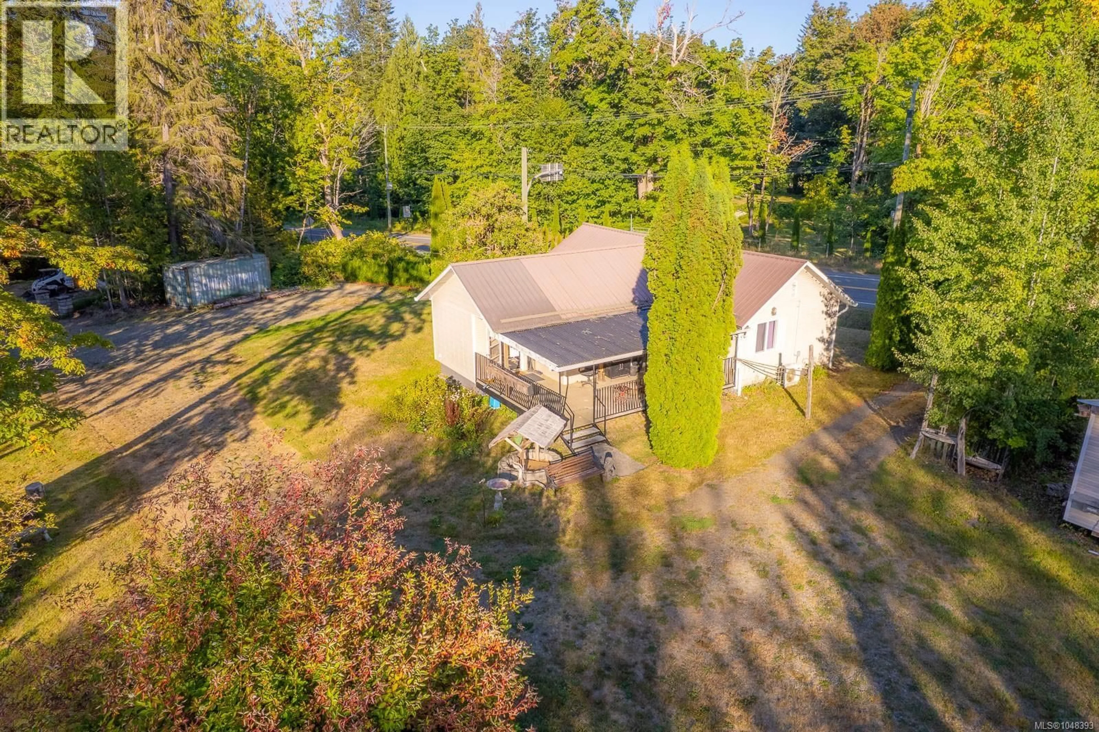 A pic from outside/outdoor area/front of a property/back of a property/a pic from drone, unknown for 8331 ISLAND HIGHWAY SOUTH, Fanny Bay British Columbia V0R1V0