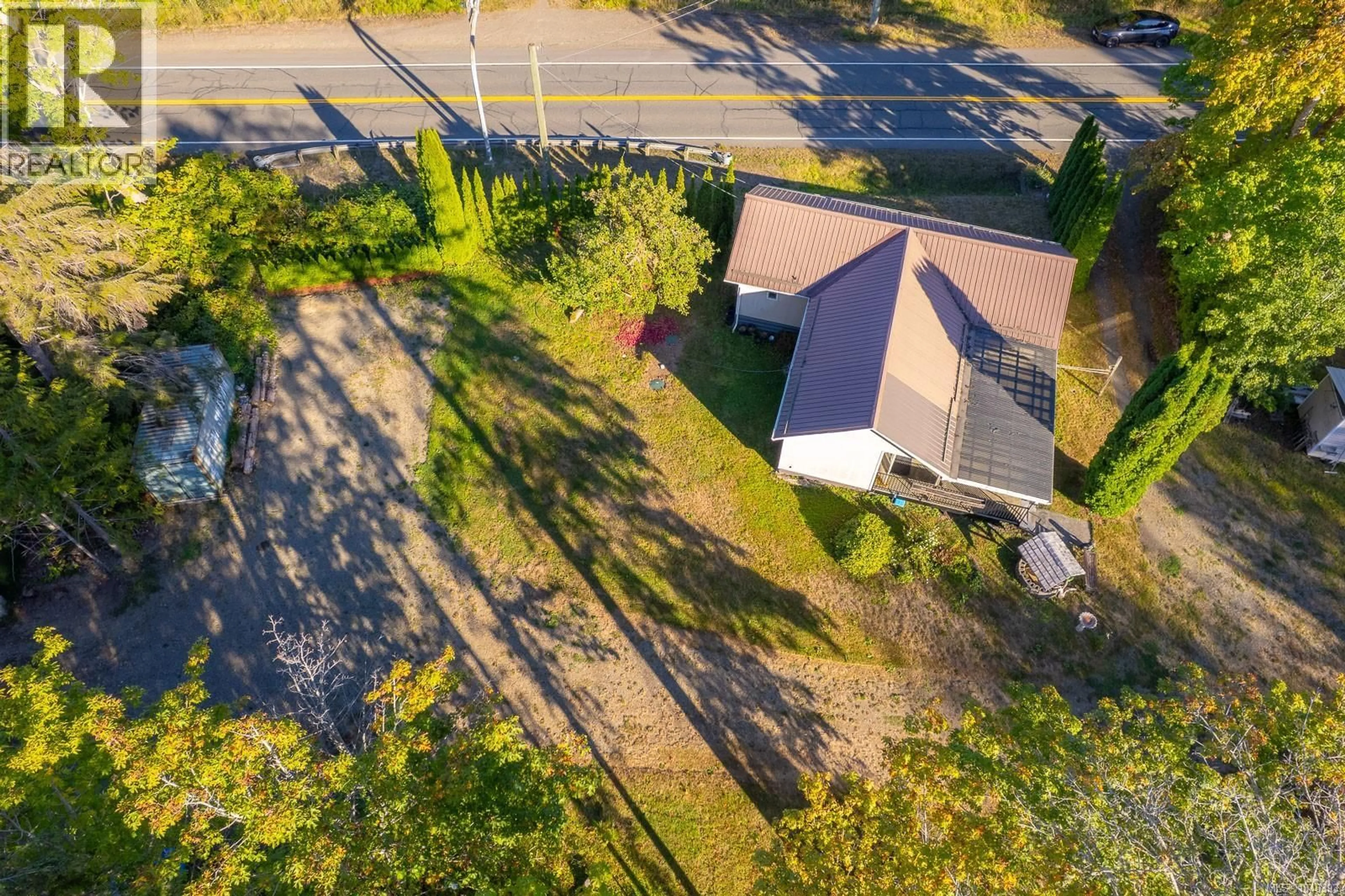 A pic from outside/outdoor area/front of a property/back of a property/a pic from drone, unknown for 8331 ISLAND HIGHWAY SOUTH, Fanny Bay British Columbia V0R1V0