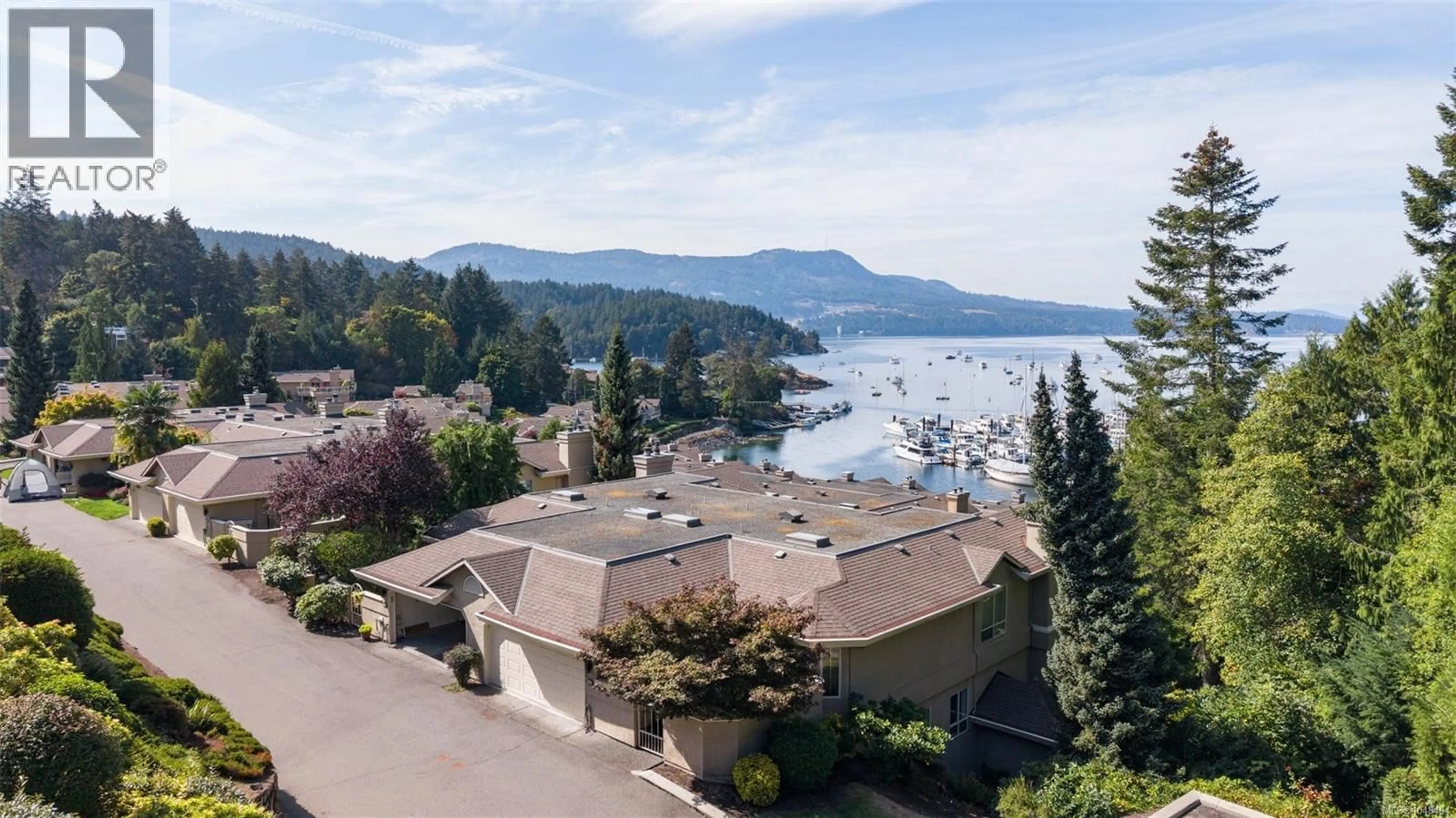 A pic from outside/outdoor area/front of a property/back of a property/a pic from drone, water/lake/river/ocean view for 736 - 6880 WALLACE DRIVE, Central Saanich British Columbia V0S1A0
