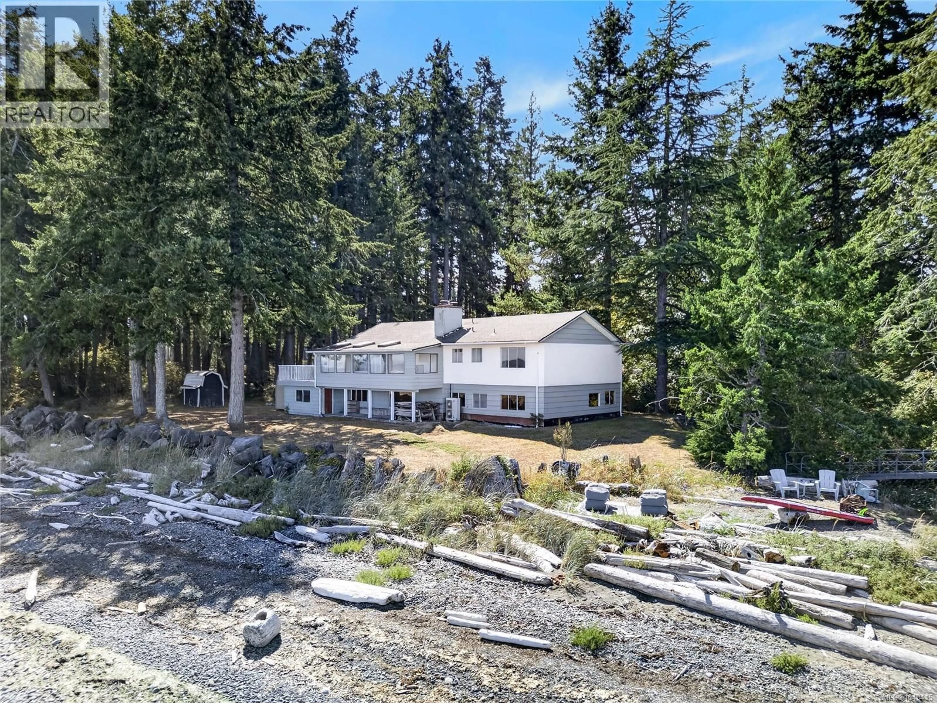 A pic from outside/outdoor area/front of a property/back of a property/a pic from drone, water/lake/river/ocean view for 1394 SEAVIEW ROAD, Black Creek British Columbia V0R1C0