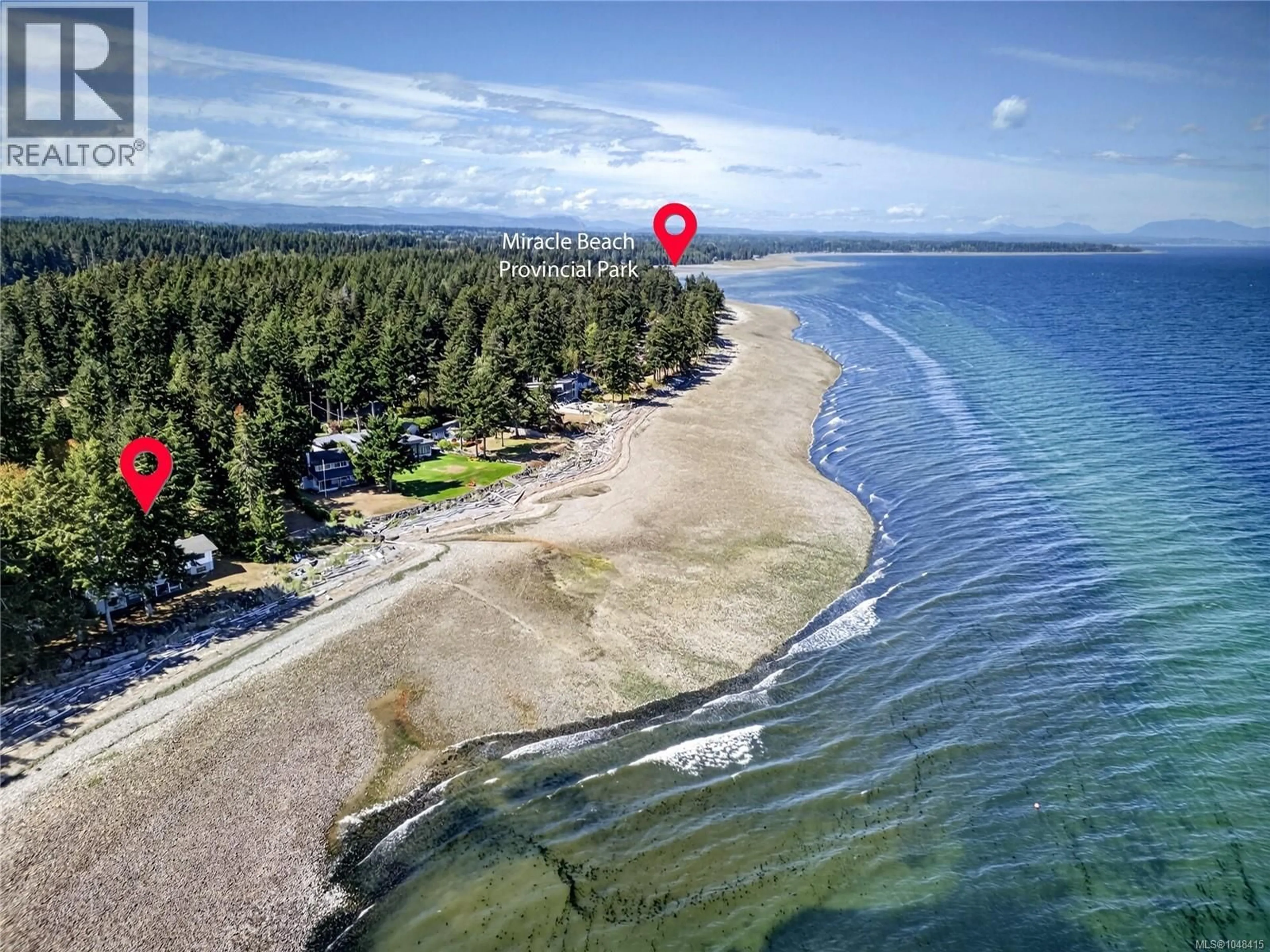 A pic from outside/outdoor area/front of a property/back of a property/a pic from drone, water/lake/river/ocean view for 1394 SEAVIEW ROAD, Black Creek British Columbia V0R1C0