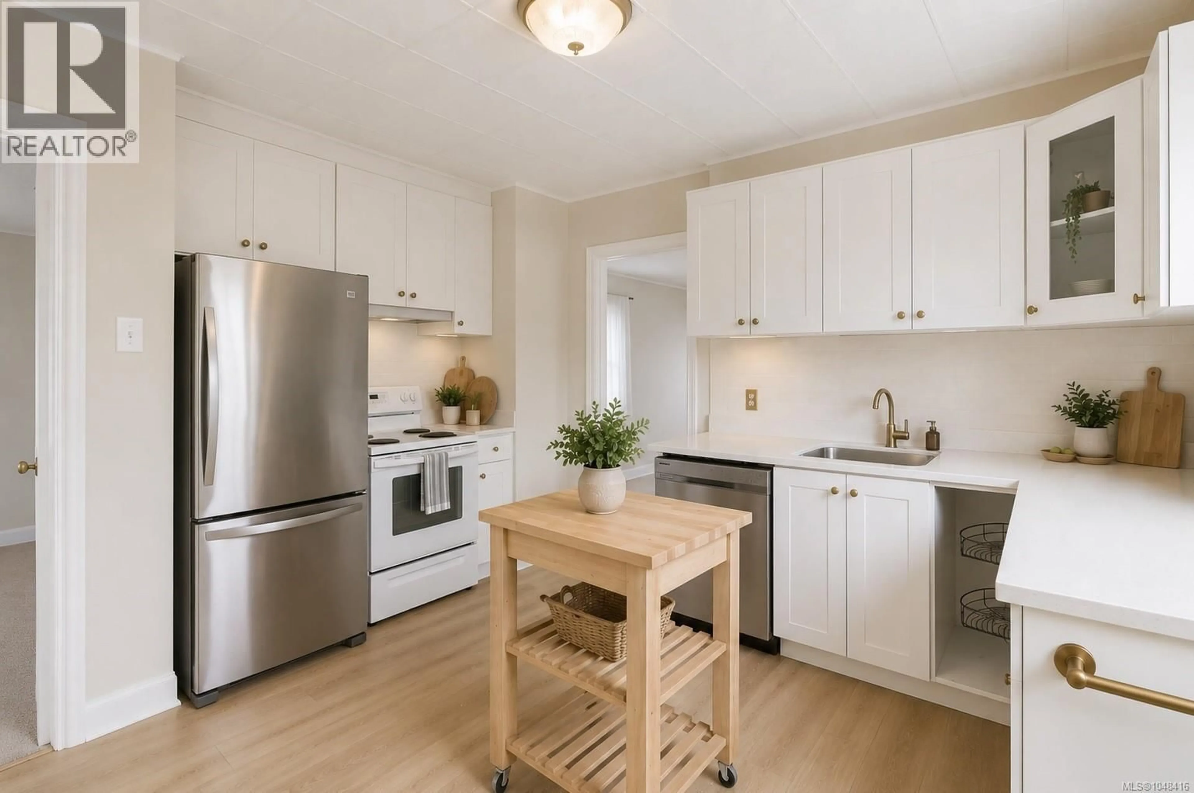 Open concept kitchen, wood/laminate floor for 131 MICHIGAN STREET, Victoria British Columbia V8V1R2