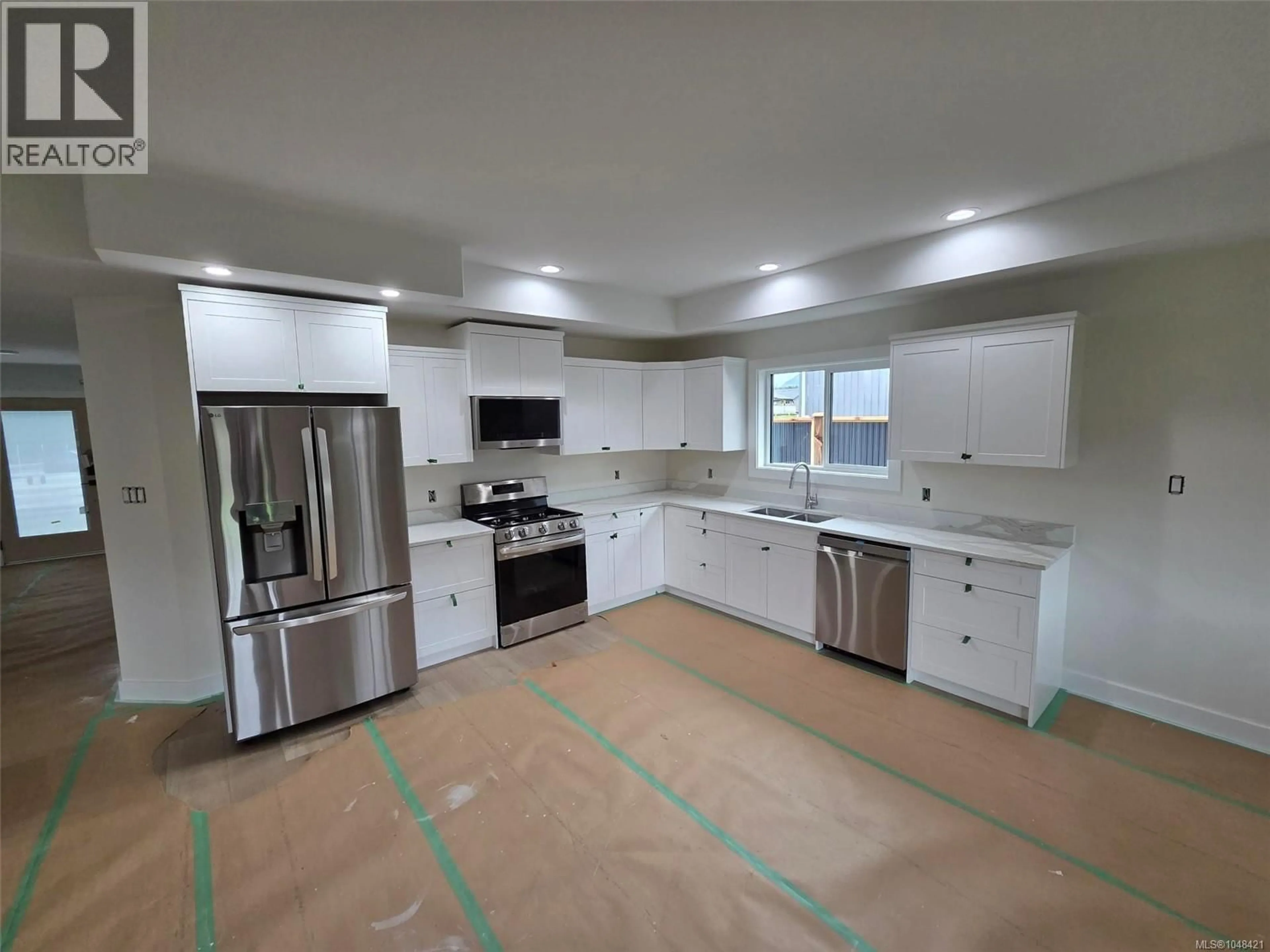 Open concept kitchen, ceramic/tile floor for 5255 TEBO AVENUE, Port Alberni British Columbia V9Y6A2